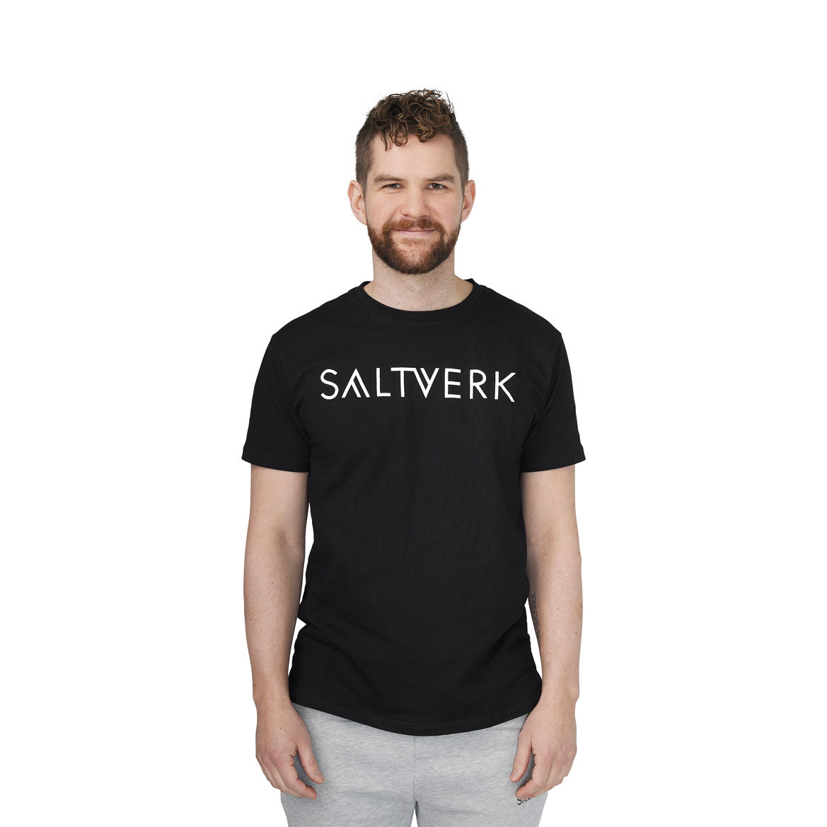 SALTVERK Black UNISEX T-Shirt displayed on a hanger, showcasing its soft cotton fabric and stylish design.