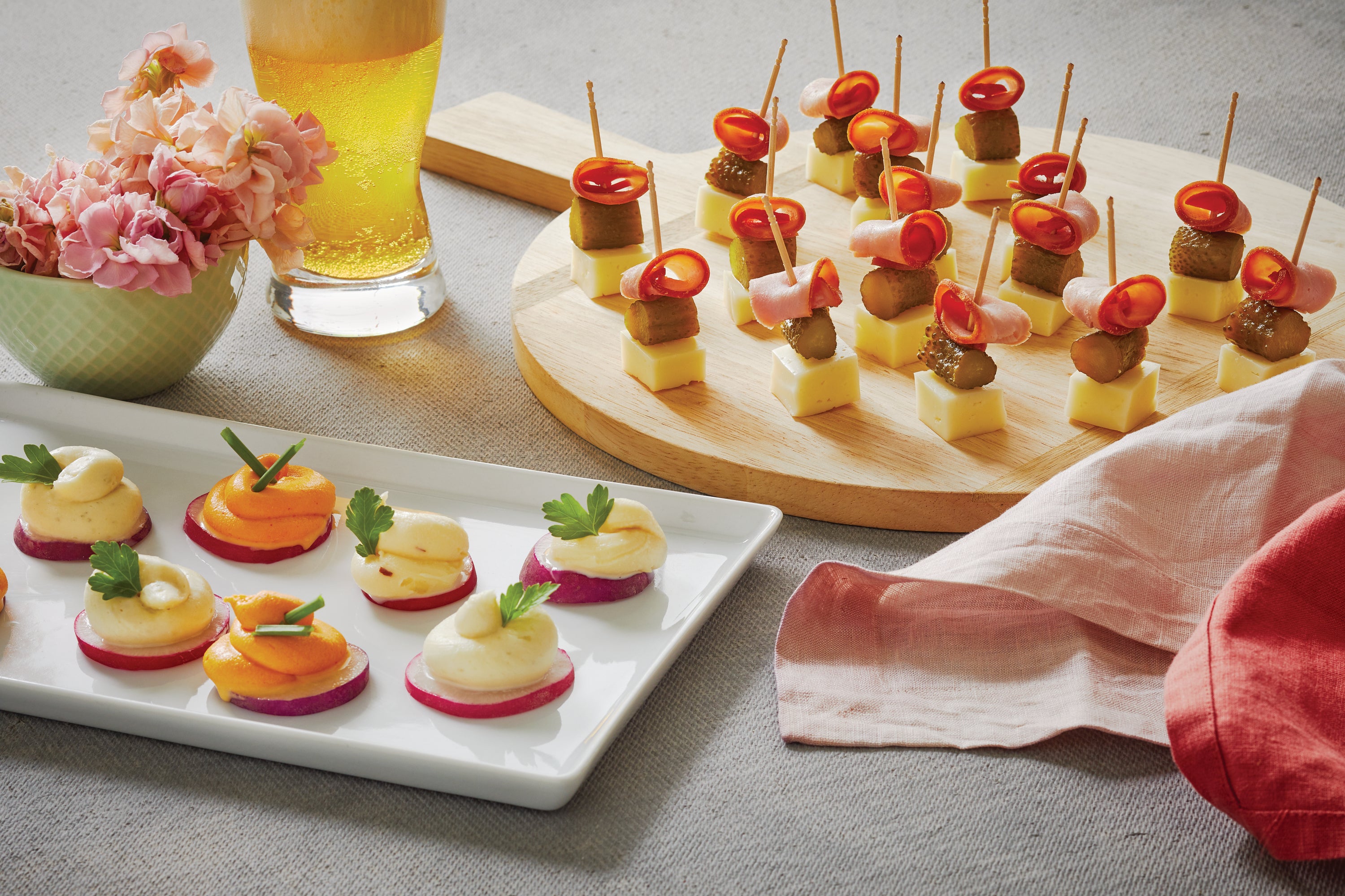 A jar of Spicy Beer Cheese Spread featuring aged cheddar, cayenne pepper, and garlic, perfect for snacking or cooking.