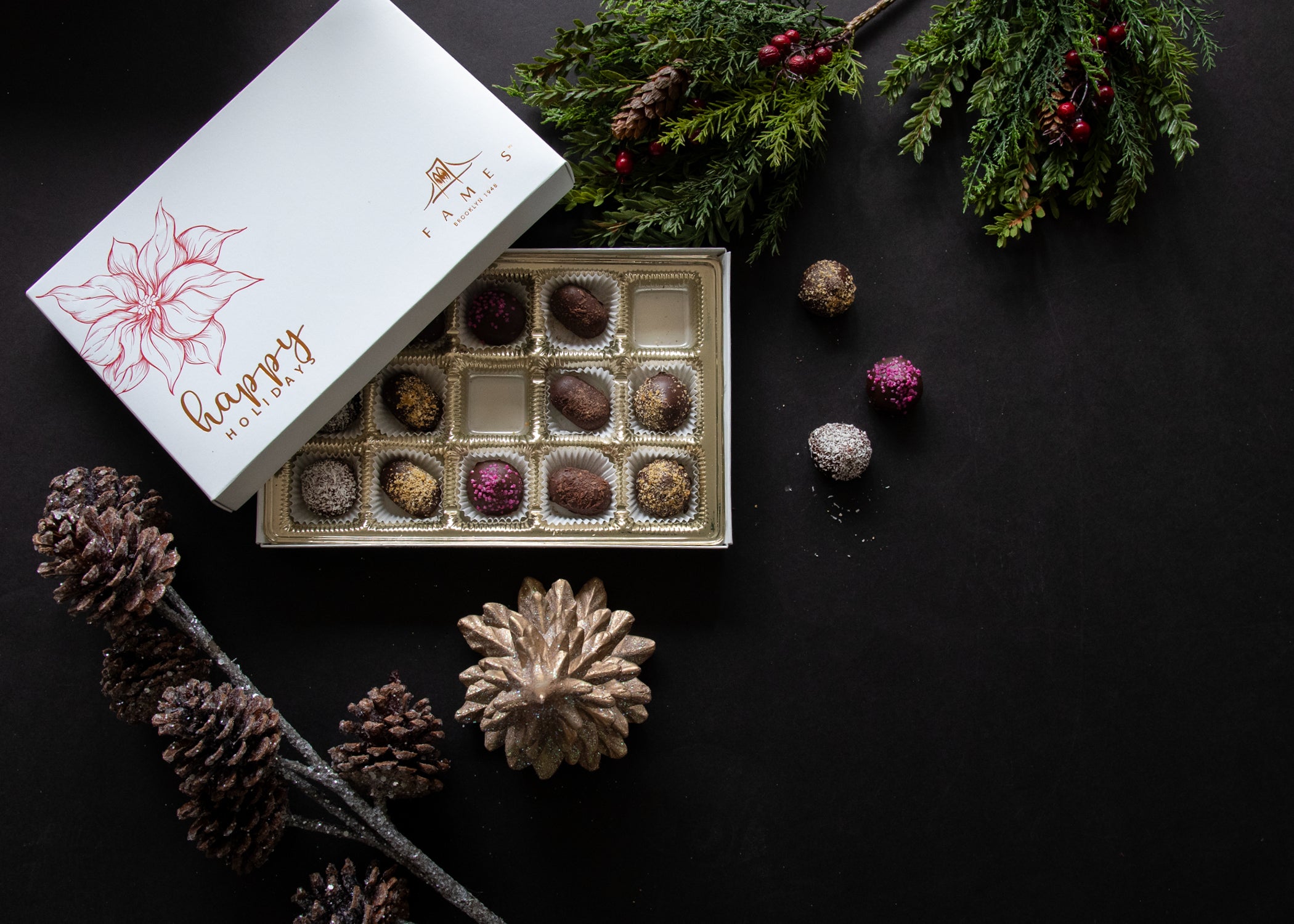 A beautifully arranged Holiday Chocolate Box containing 15 Dairy-Free Chocolate Bonbons in various flavors.