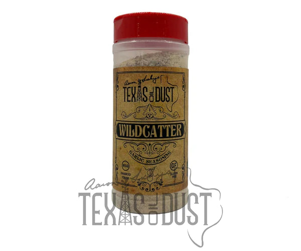 Texas Oil Dust Wildcatter Garlic seasoning in a jar, showcasing its rich texture and garlic flavor.