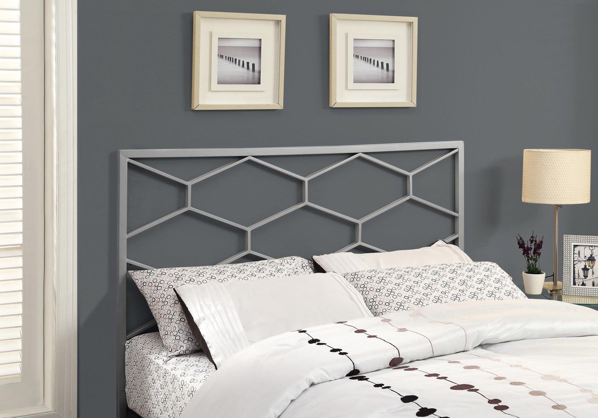 Elegant Silver metal headboard designed for Queen or Full size beds, featuring a sophisticated design and durable construction.