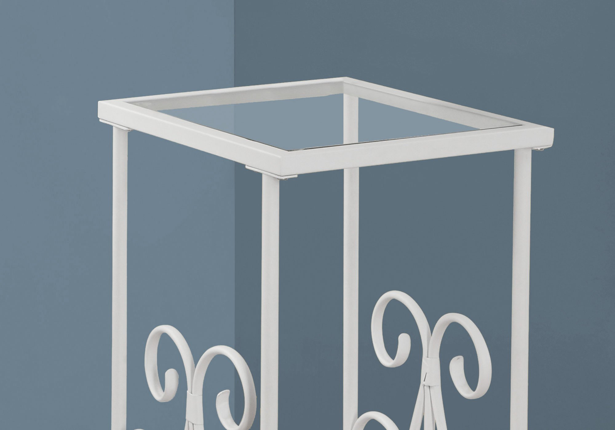 A stylish 12" x 16" x 30" white clear metal tempered glass accent table, showcasing its sleek design and elegant finish.