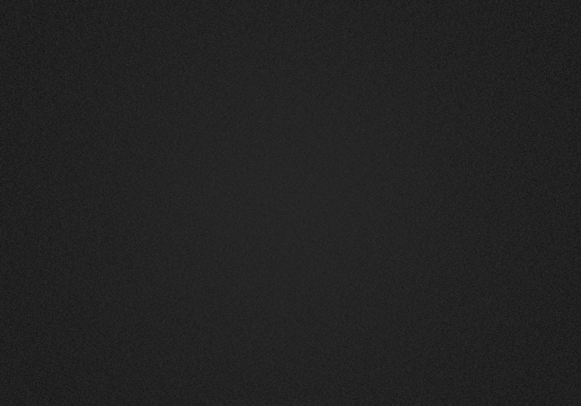 A sleek 12x42x32 tempered glass and black metal accent table, showcasing a modern design suitable for various home decor styles.