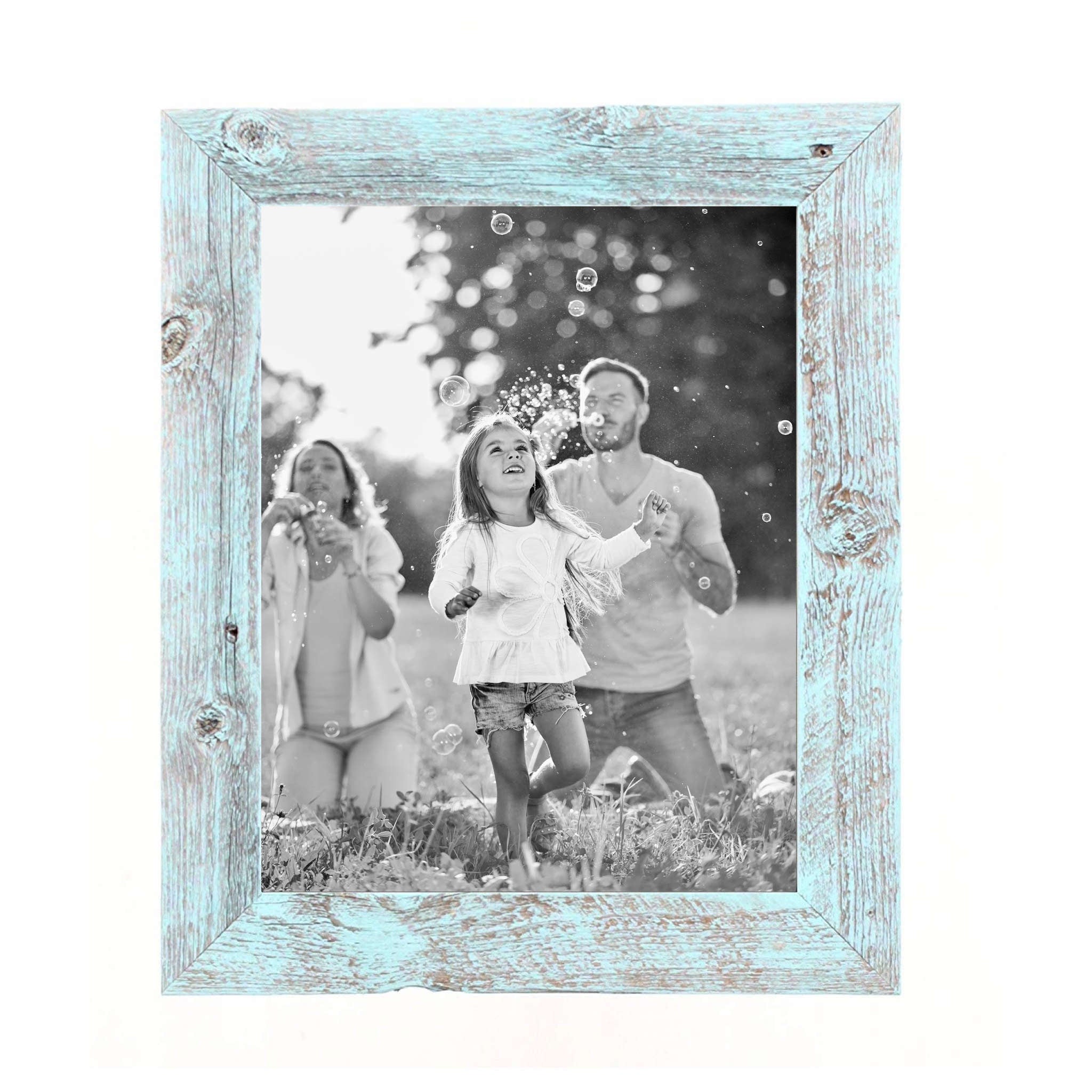 A rustic blue picture frame measuring 12x14 inches, made from reclaimed wood, showcasing an 8.5x11 photograph.