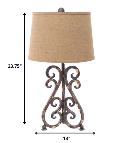 Bronze vintage metal table lamp with khaki linen shade and floral base, perfect for home decor.