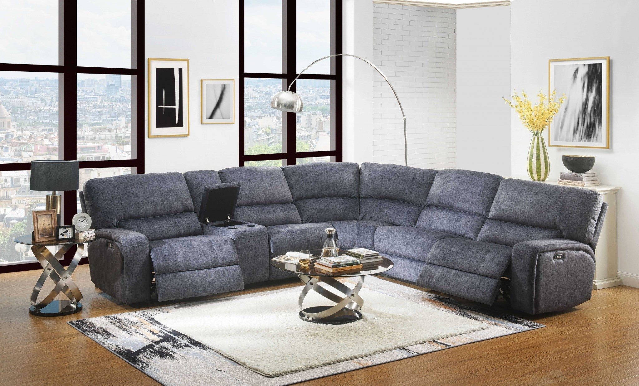 A luxurious black leather-aire motion sofa with plush cushions and USB docks on both sides, designed for modern living rooms.