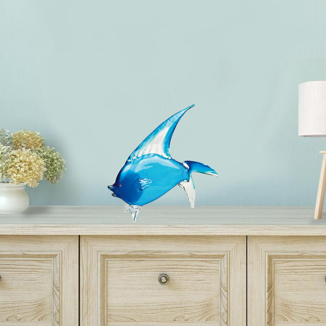 A beautifully crafted 16-inch mouth blown light blue tropical fish art glass dolphin, showcasing intricate details and vibrant color.