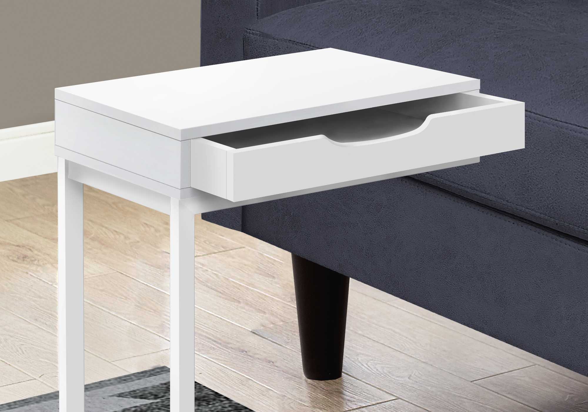 A stylish white metal accent table with a drawer, featuring a C-shaped design for easy placement beside a sofa or bed.