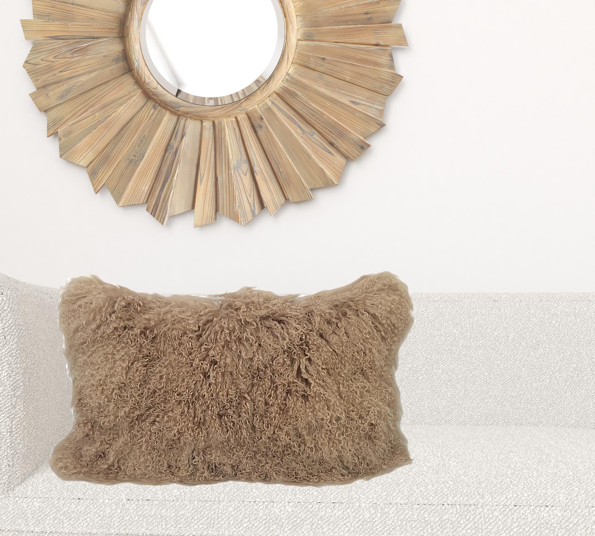 A luxurious 17-inch beige pillow made from genuine Tibetan lamb fur with a soft microsuede backing, perfect for home decor.