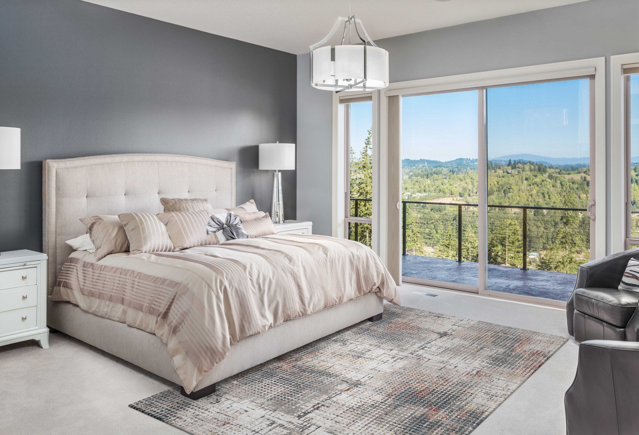 A large 118 x 158 grey and brick polypropylene and polyester rug with abstract traditional patterns, perfect for contemporary home decor.