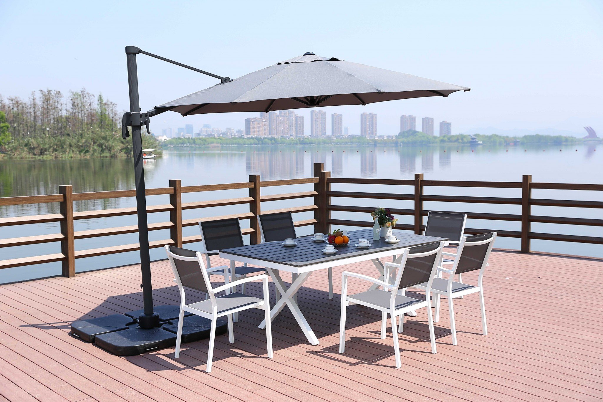 A stylish 118" X 118" X 97" gray steel standing umbrella, showcasing contemporary design and high-grade iron construction.