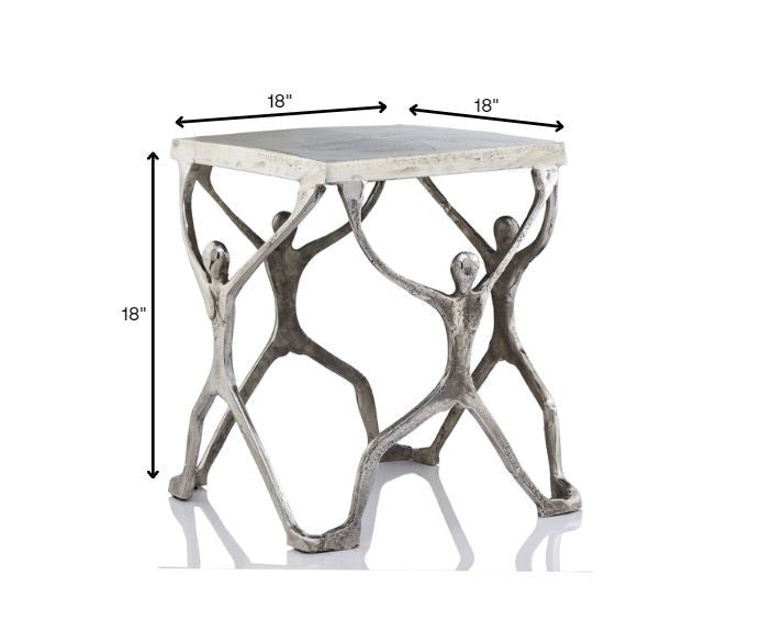 A stylish 18x18x18 buffed man figure table made of aluminum, showcasing a modern design with a polished surface.