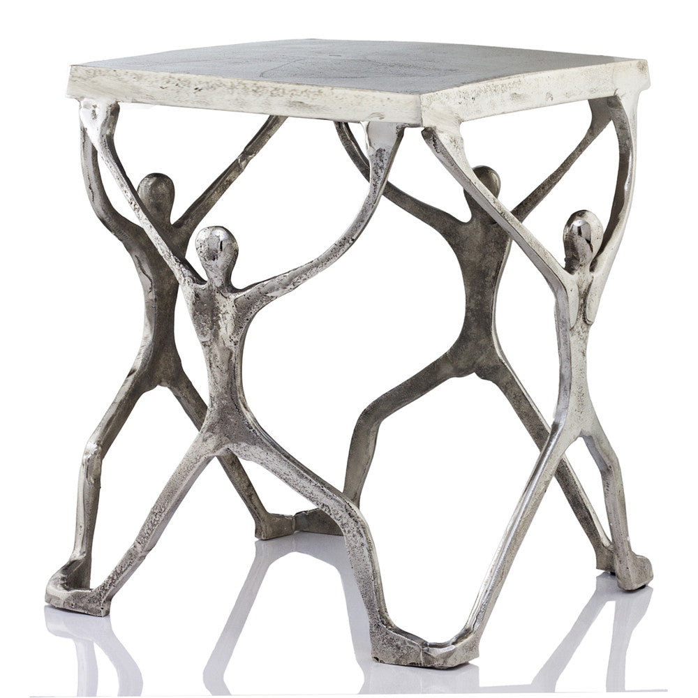 A stylish 18x18x18 buffed man figure table made of aluminum, showcasing a modern design with a polished surface.