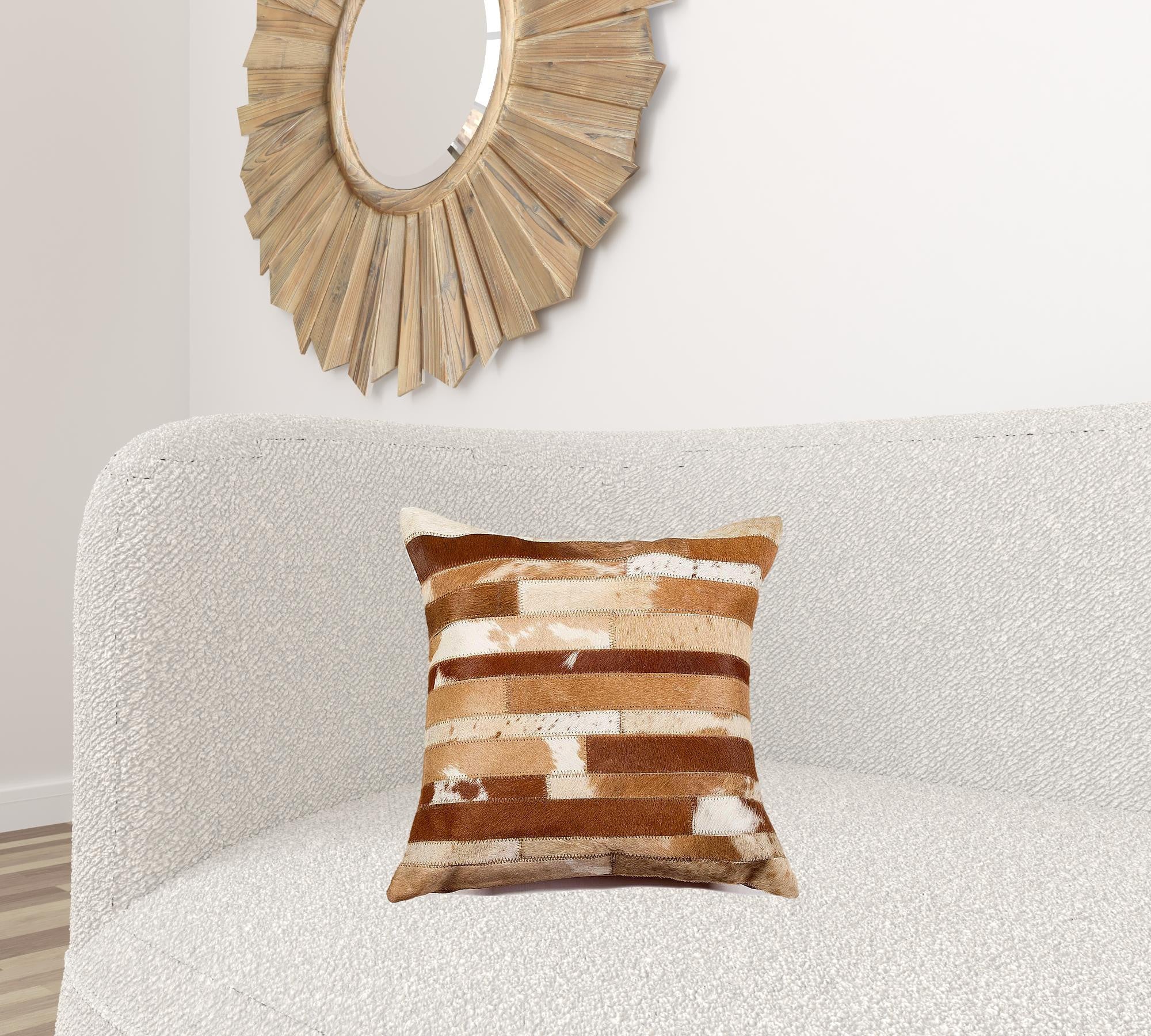 18x18 brown and natural decorative pillow made from premium cowhide with soft microsuede backing and hidden zipper closure.