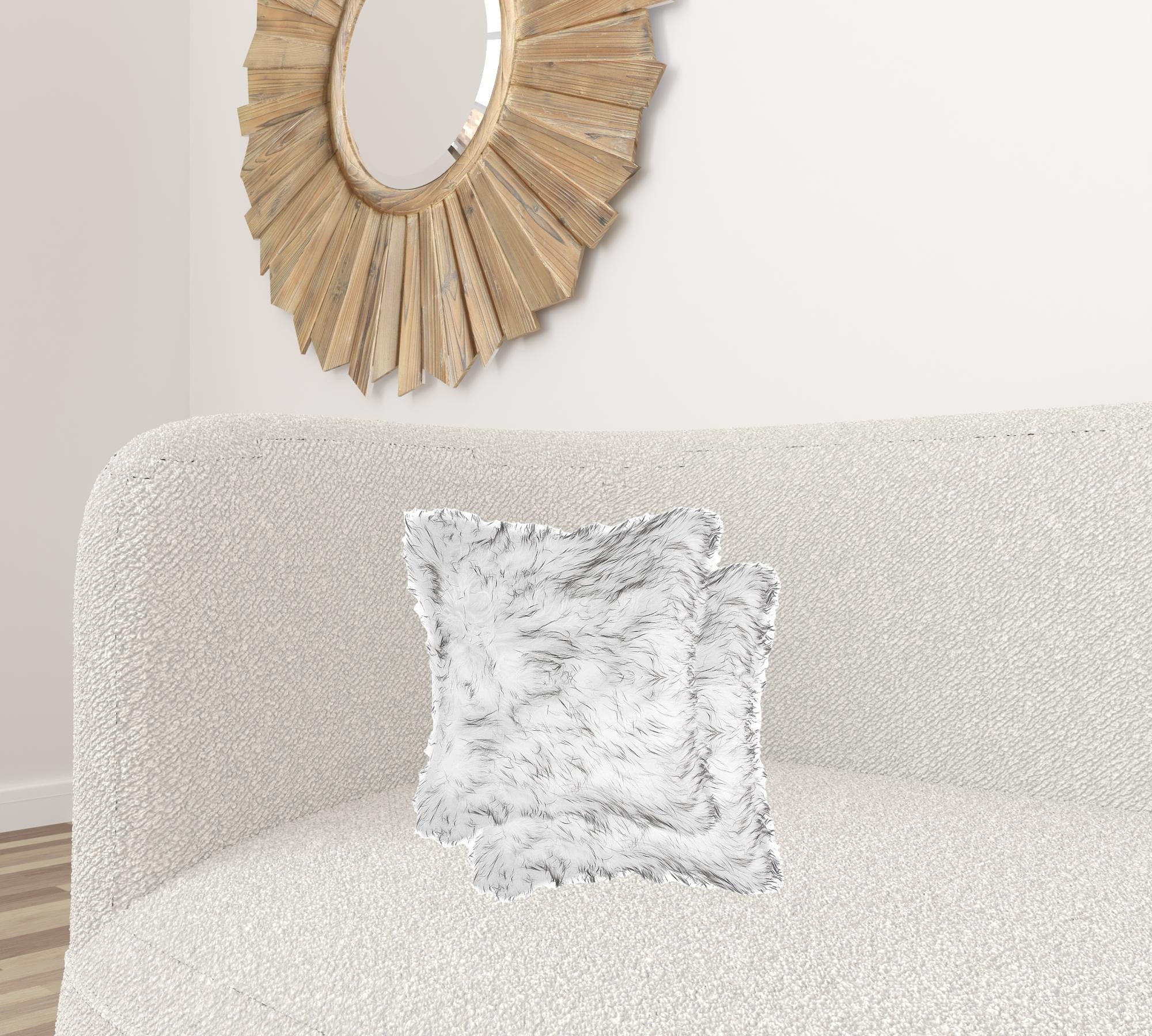 Two luxurious gradient gray faux fur pillows, measuring 18x18 inches, showcasing a plush texture and elegant design.