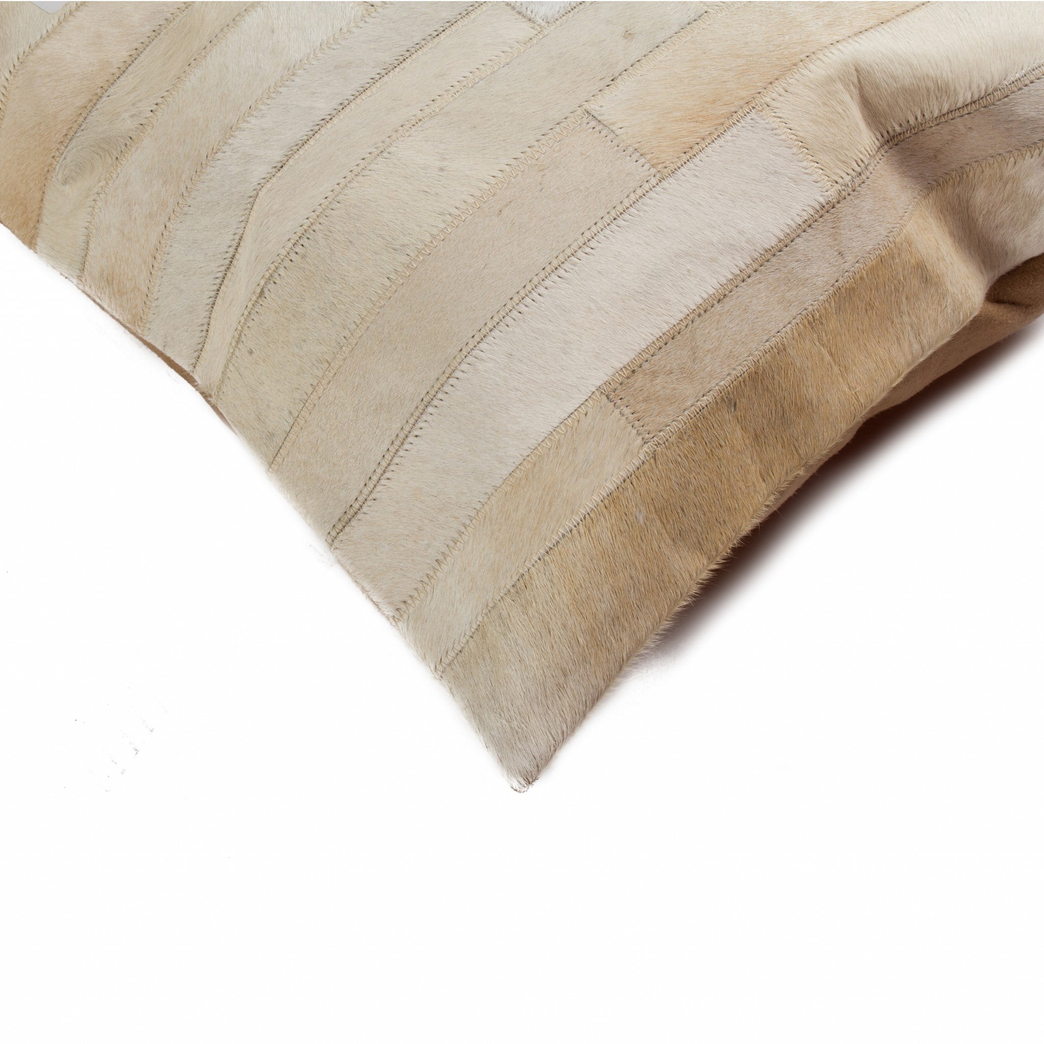 18x18 natural cowhide pillow with soft microsuede backing and hidden zipper closure, showcasing unique shades and textures.
