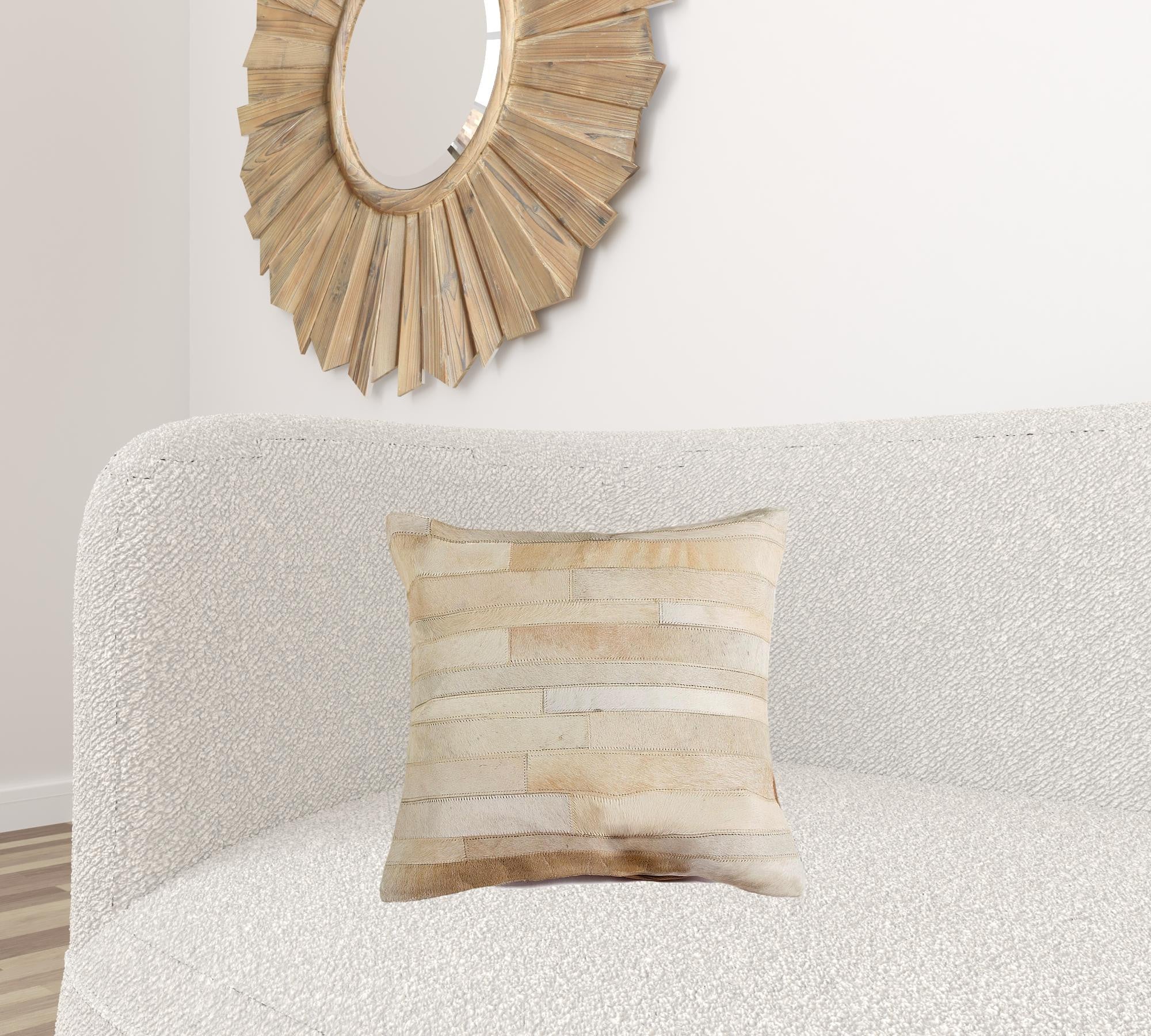 18x18 natural cowhide pillow with soft microsuede backing and hidden zipper closure, showcasing unique shades and textures.