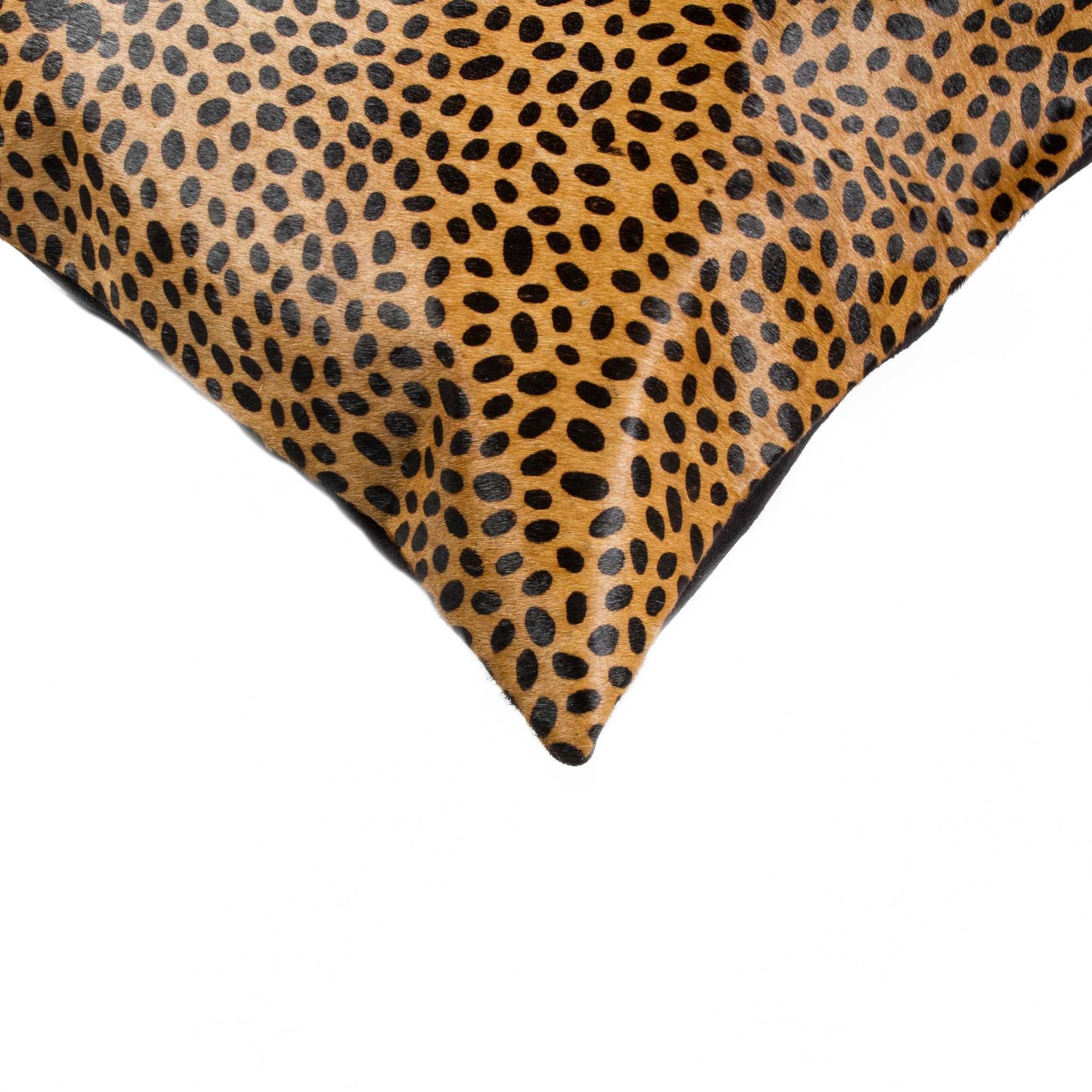 Luxurious 18x18 Sensational Cheetah Torino Kobe Cowhide pillow showcasing unique mottling and textures, perfect for home decor.