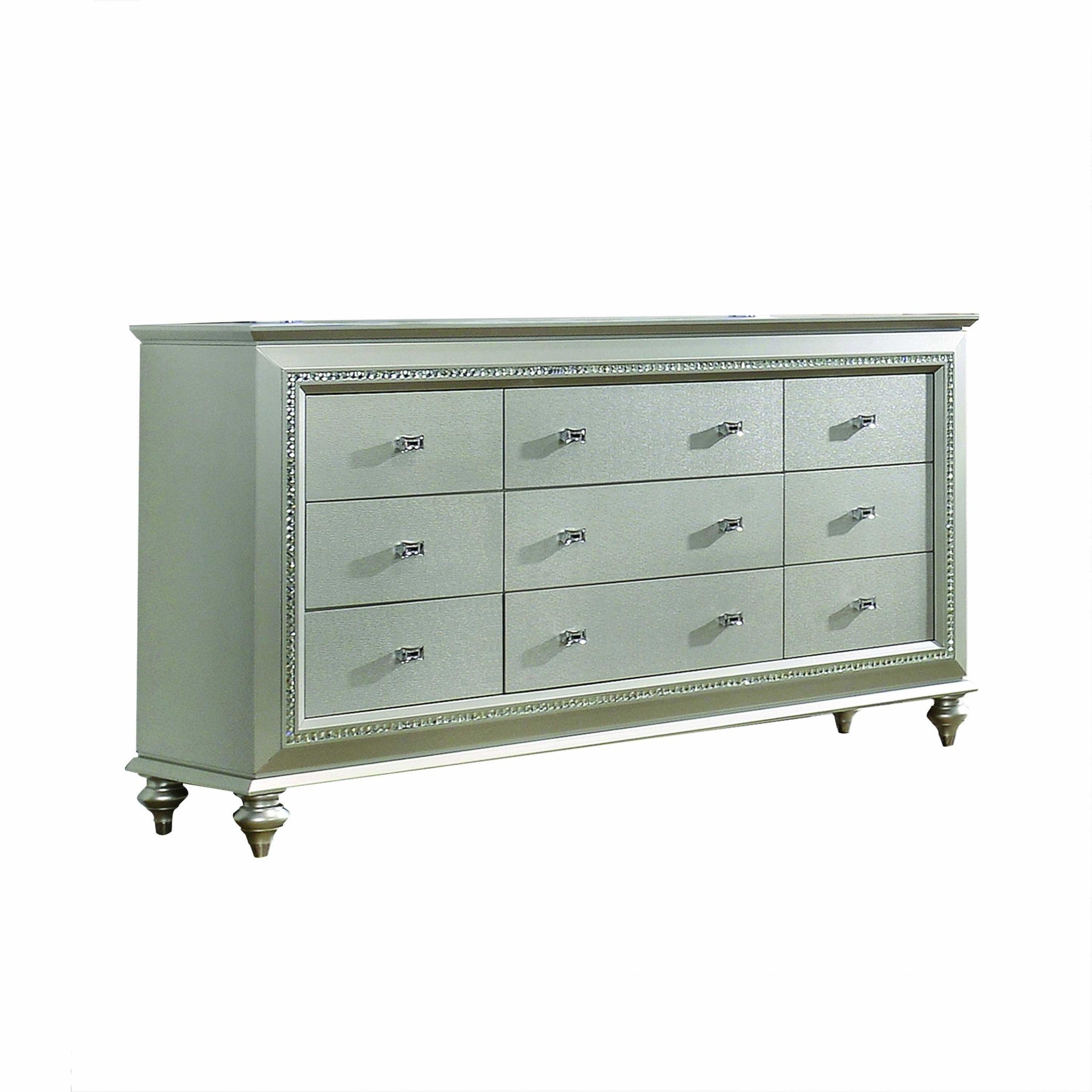 Elegant champagne wood dresser with textured front and sparkling trim, perfect for contemporary bedrooms.