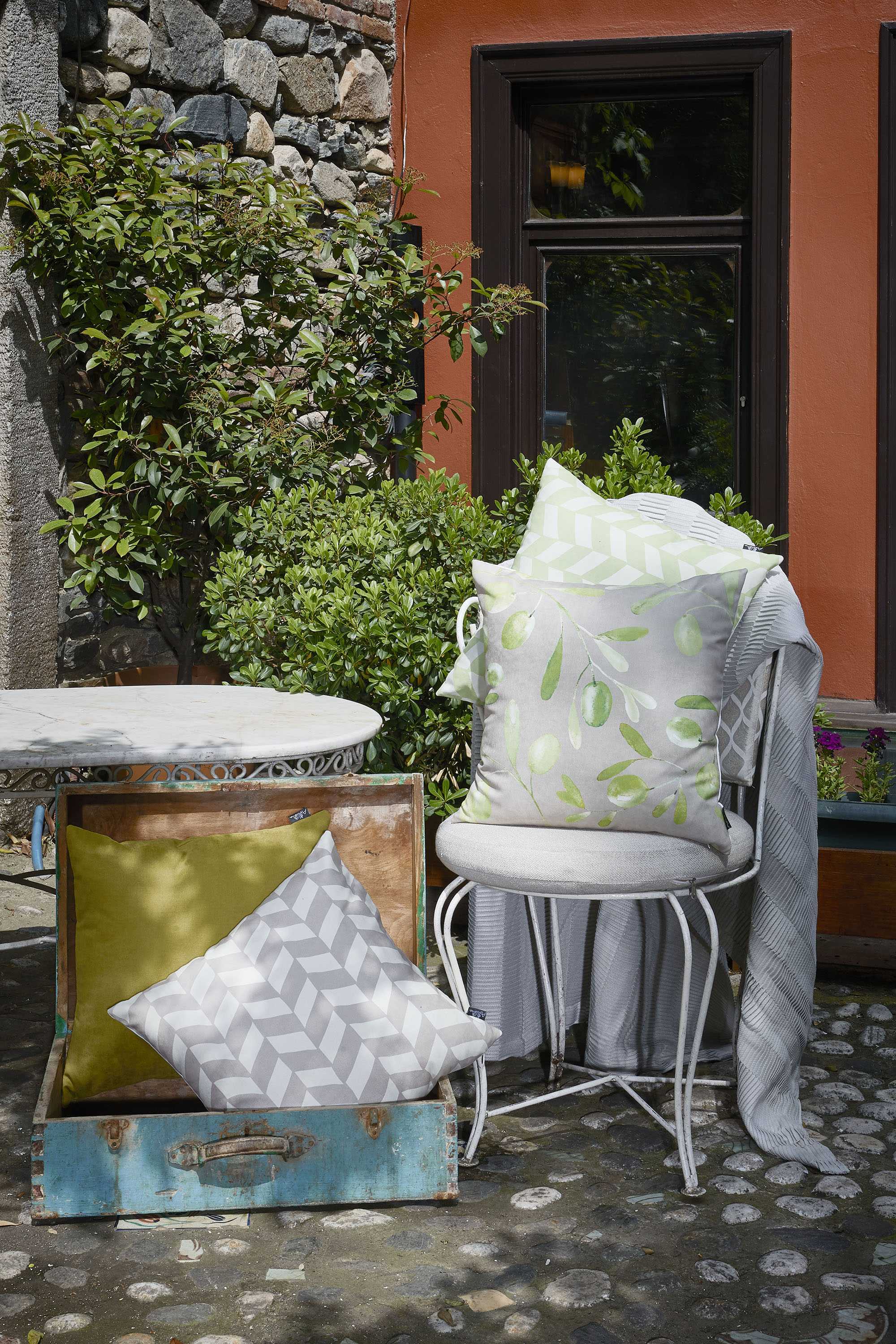 18x18 Gray Olive Towers Decorative Throw Pillow Cover featuring vibrant patterns and a hidden zipper closure.