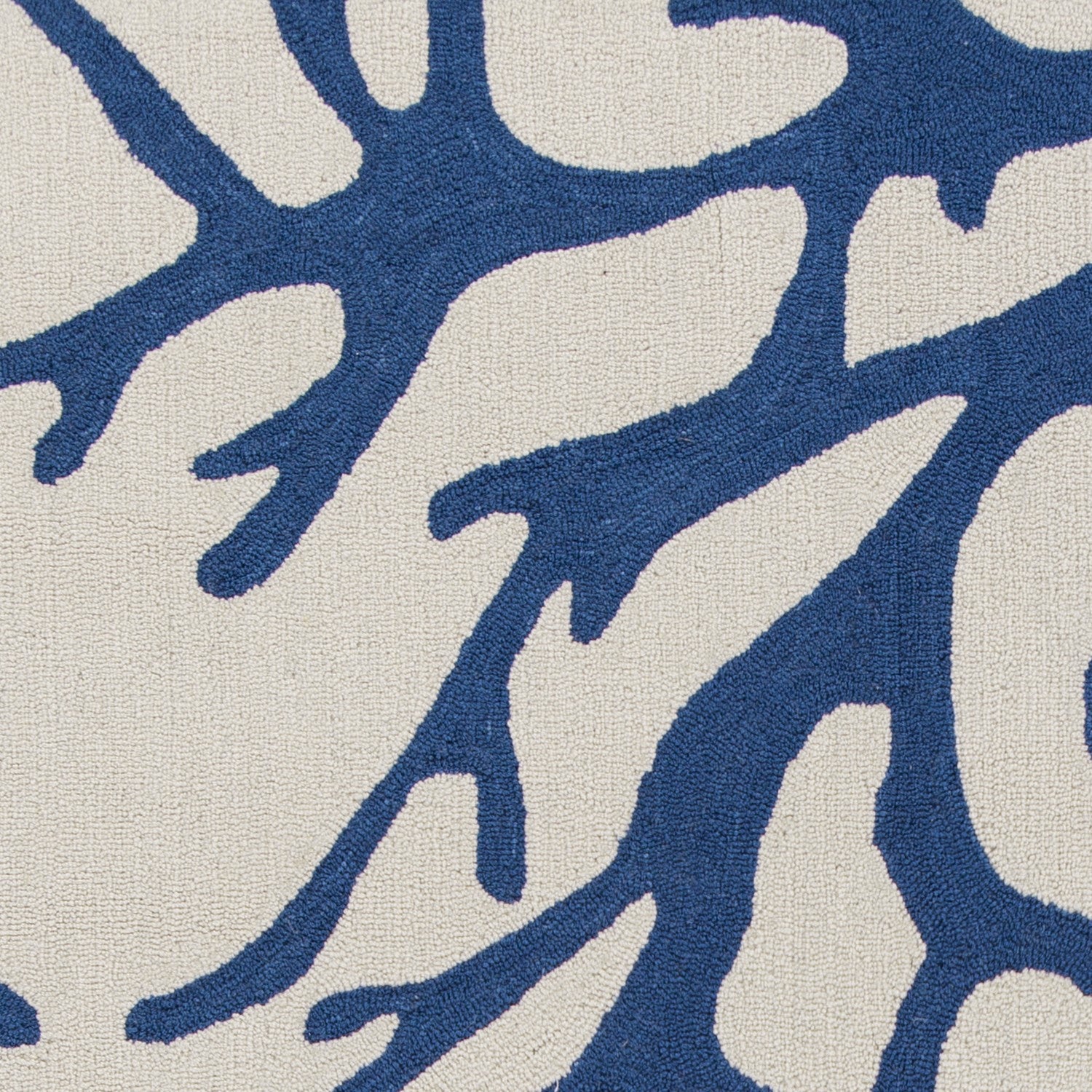A stylish 2' x 4' area rug in ivory and blue, featuring a hand-hooked design, perfect for contemporary home decor.
