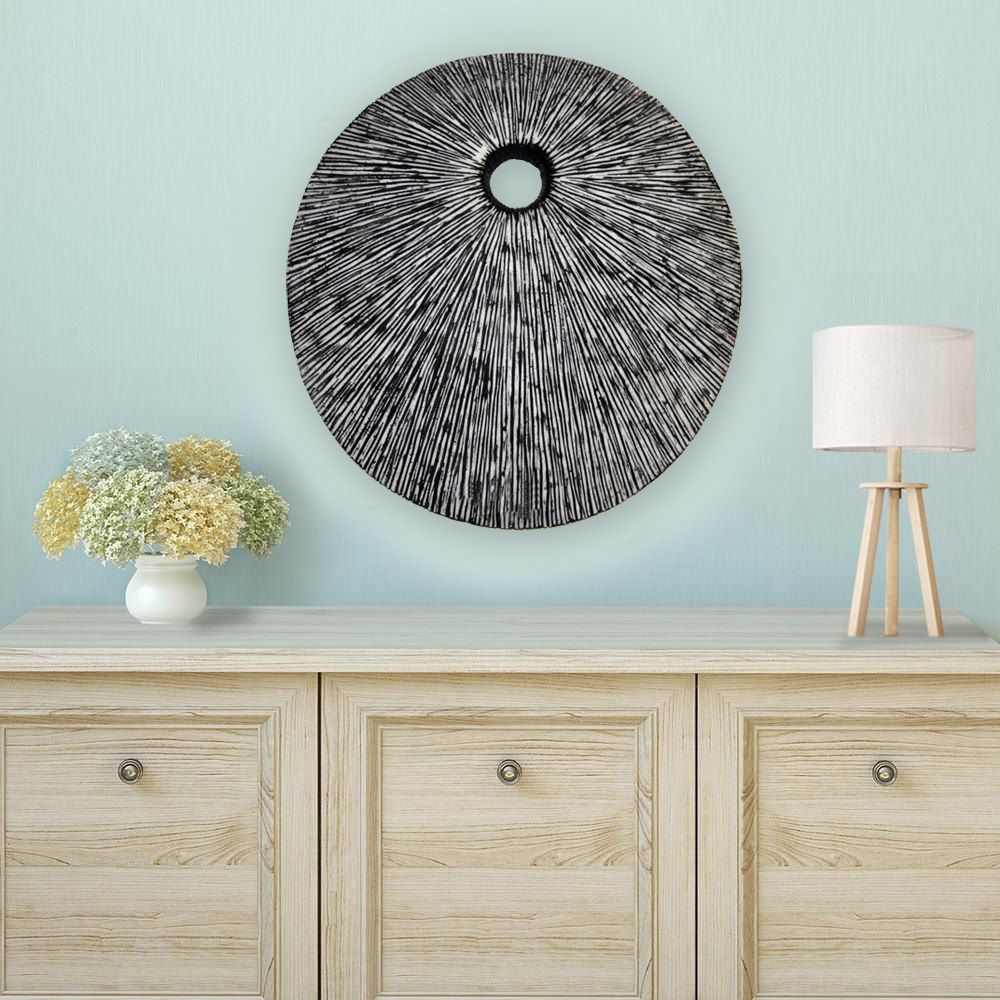 20-inch contemporary grey round wall art featuring a spiral design and textured finish, crafted from dark grey sandstone.