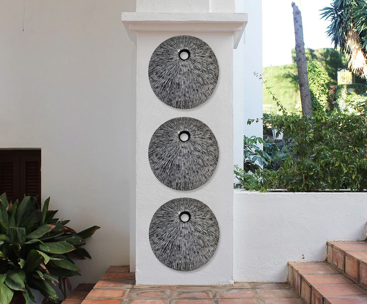 20-inch contemporary grey round wall art featuring a spiral design and textured finish, crafted from dark grey sandstone.