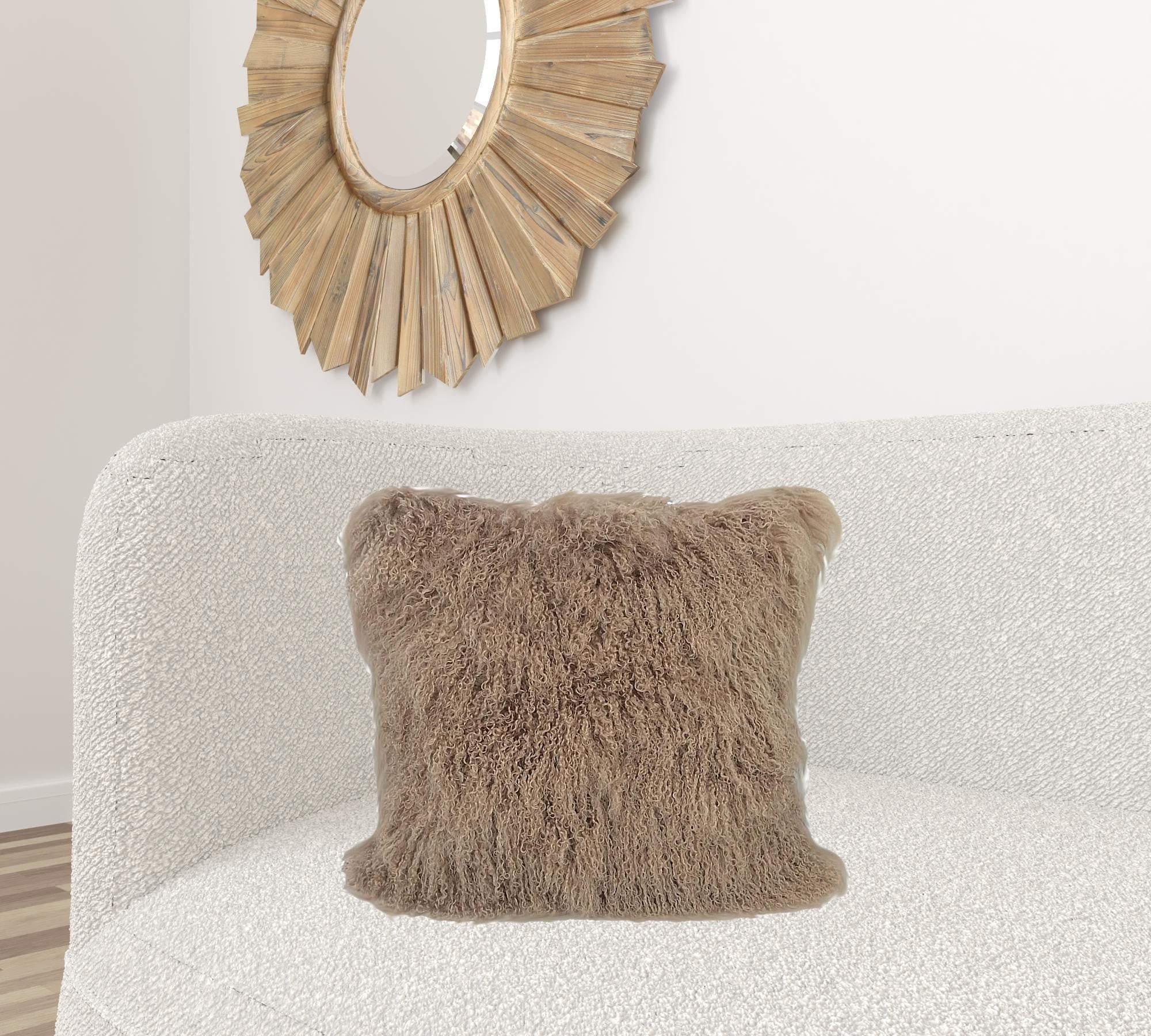 20-inch beige genuine Tibetan lamb fur pillow with microsuede backing, showcasing its luxurious texture and elegant design.