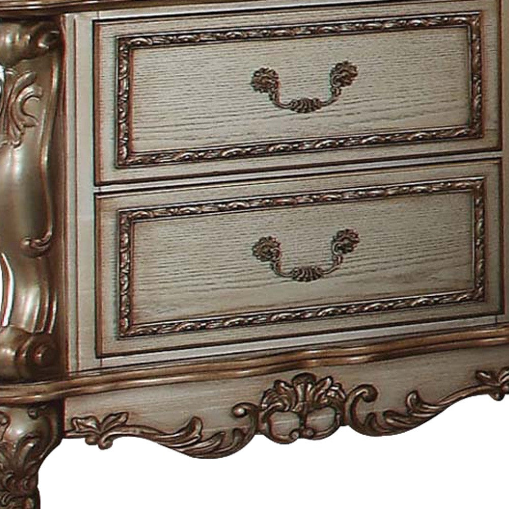 Elegant gold patina bone wood poly resin nightstand with two felt-lined drawers and vintage design.