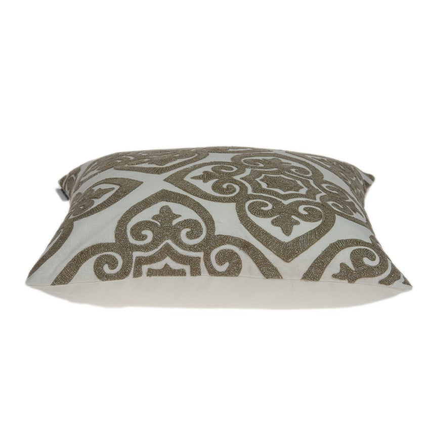 A luxurious 20x7x20 bling ivory pillow cover made from soft cotton fabric, featuring a poly insert for comfort, elegantly displayed on a sofa.