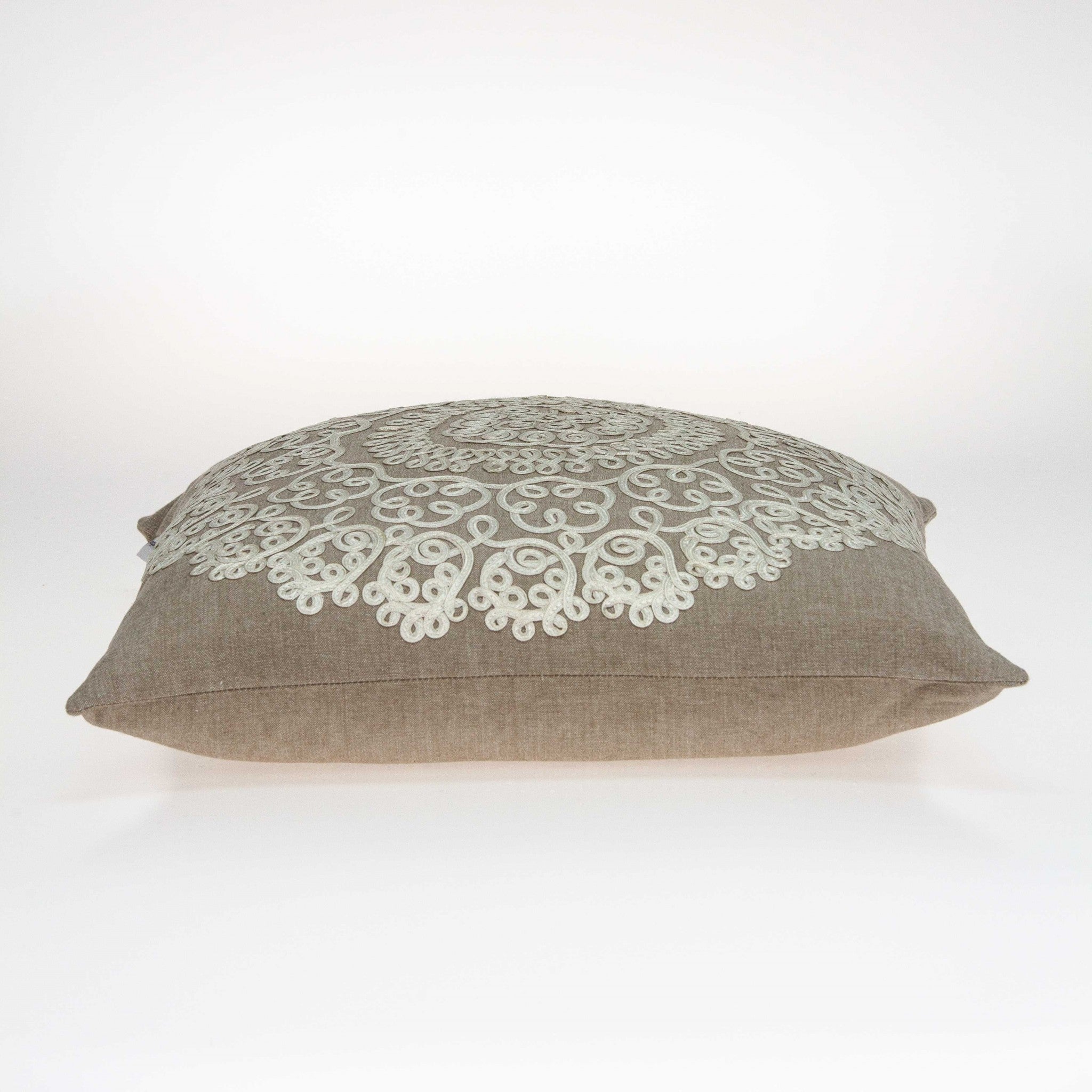 Traditional tan pillow cover measuring 20x7x20 inches with floral pattern and polyfill insert, perfect for home decor.