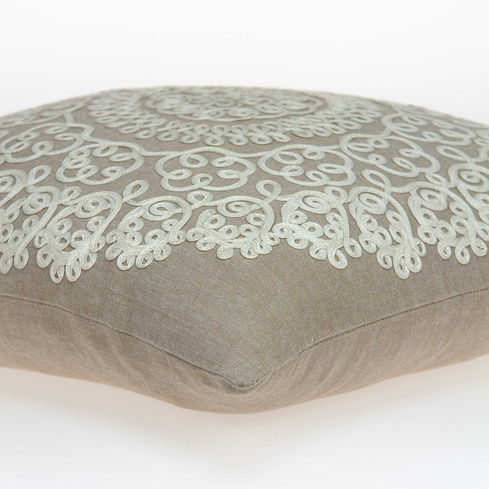 Traditional tan pillow cover measuring 20x7x20 inches with floral pattern and polyfill insert, perfect for home decor.