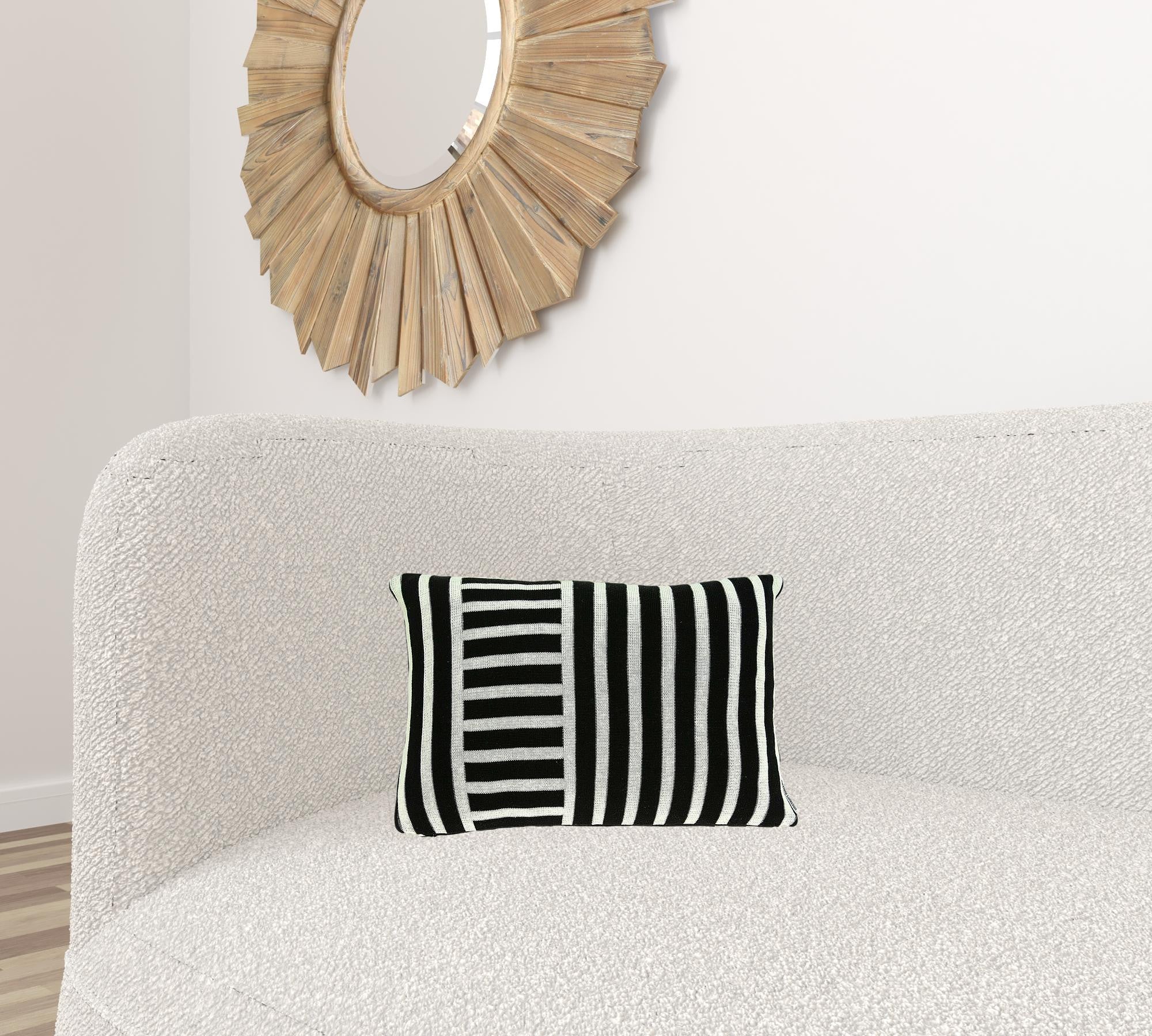 Transitional black solid pillow cover measuring 20x7x20 inches, made from cotton and viscose with polyfill insert.
