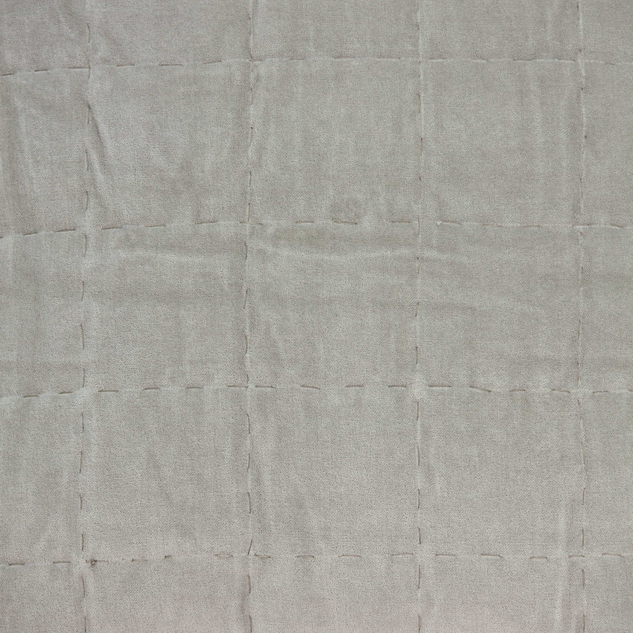 Transitional gray solid quilted pillow measuring 20x7x20 inches, featuring a soft cotton and viscose blend for comfort and style.