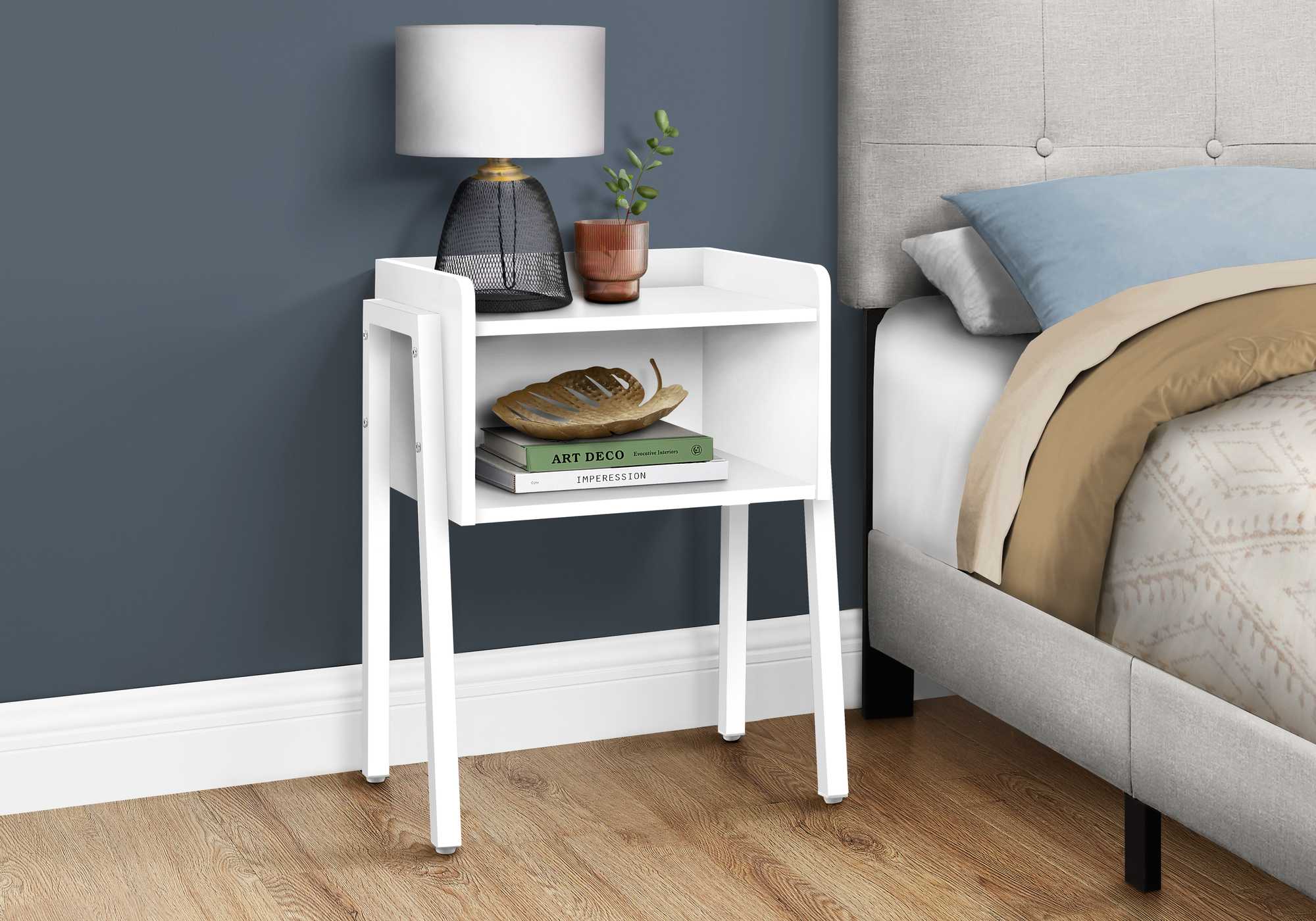 23-inch rectangular white accent table with white metal legs, featuring an open shelf for storage and a modern design.