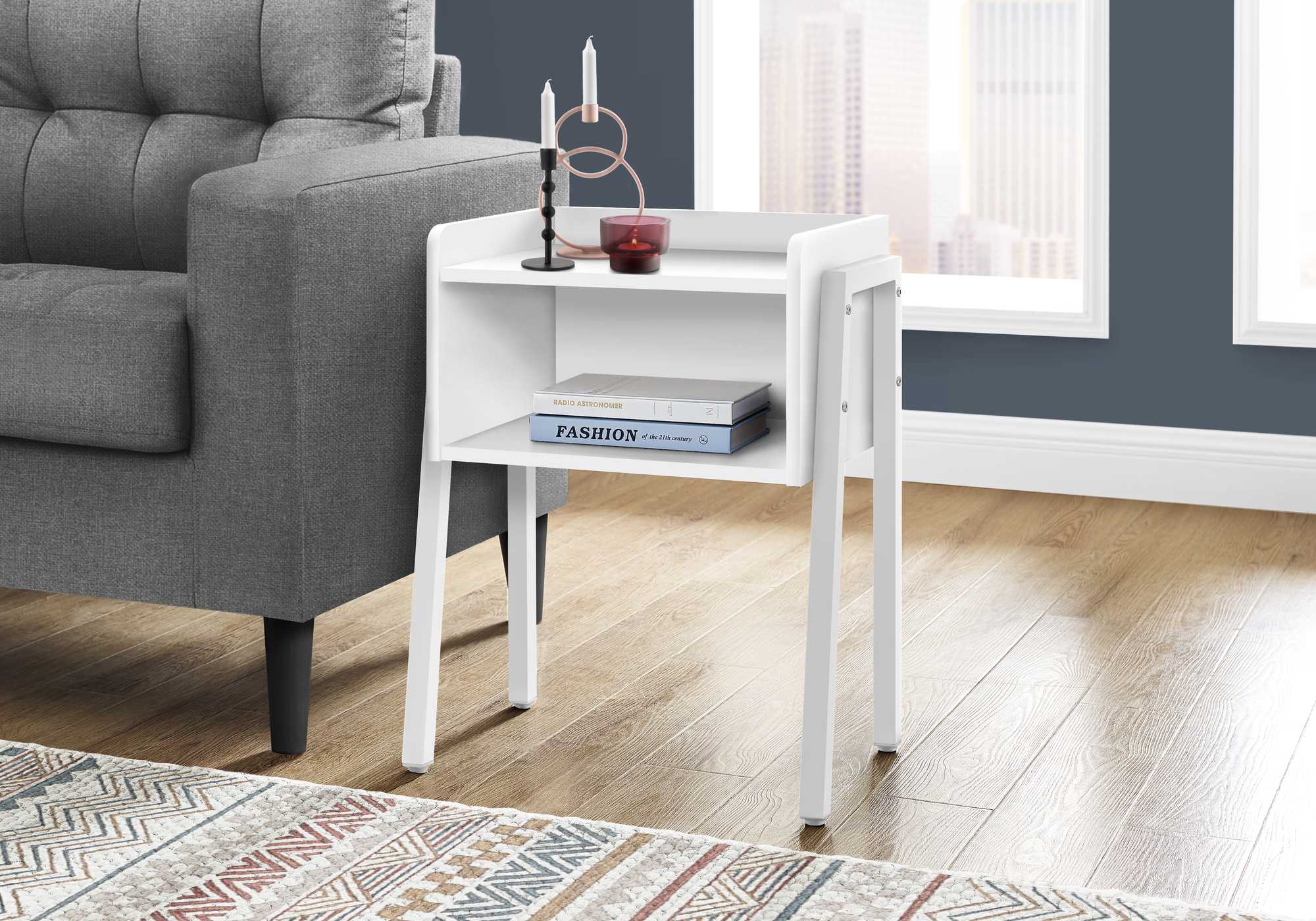 23-inch rectangular white accent table with white metal legs, featuring an open shelf for storage and a modern design.