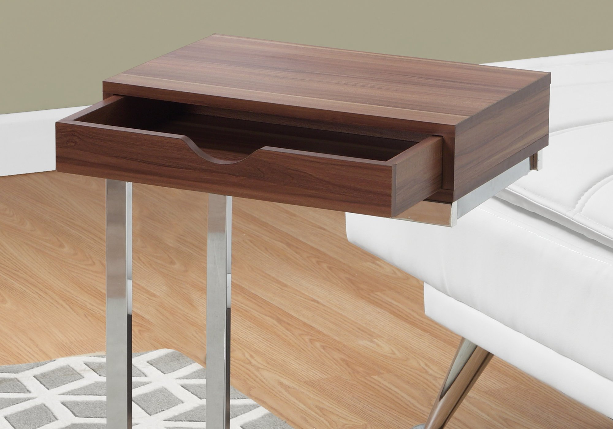 A stylish 24.5-inch white accent table with chromed metal accents, featuring a storage drawer on either side.