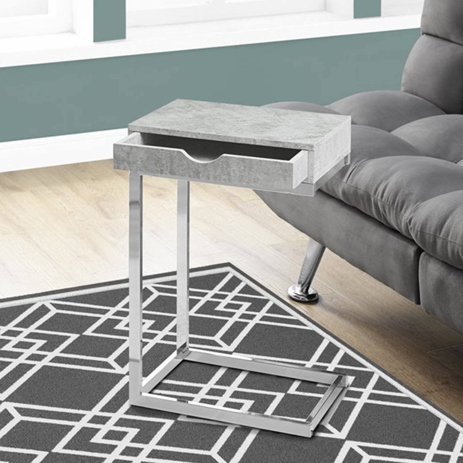 A stylish 24.5-inch white accent table with chromed metal accents, featuring a storage drawer on either side.