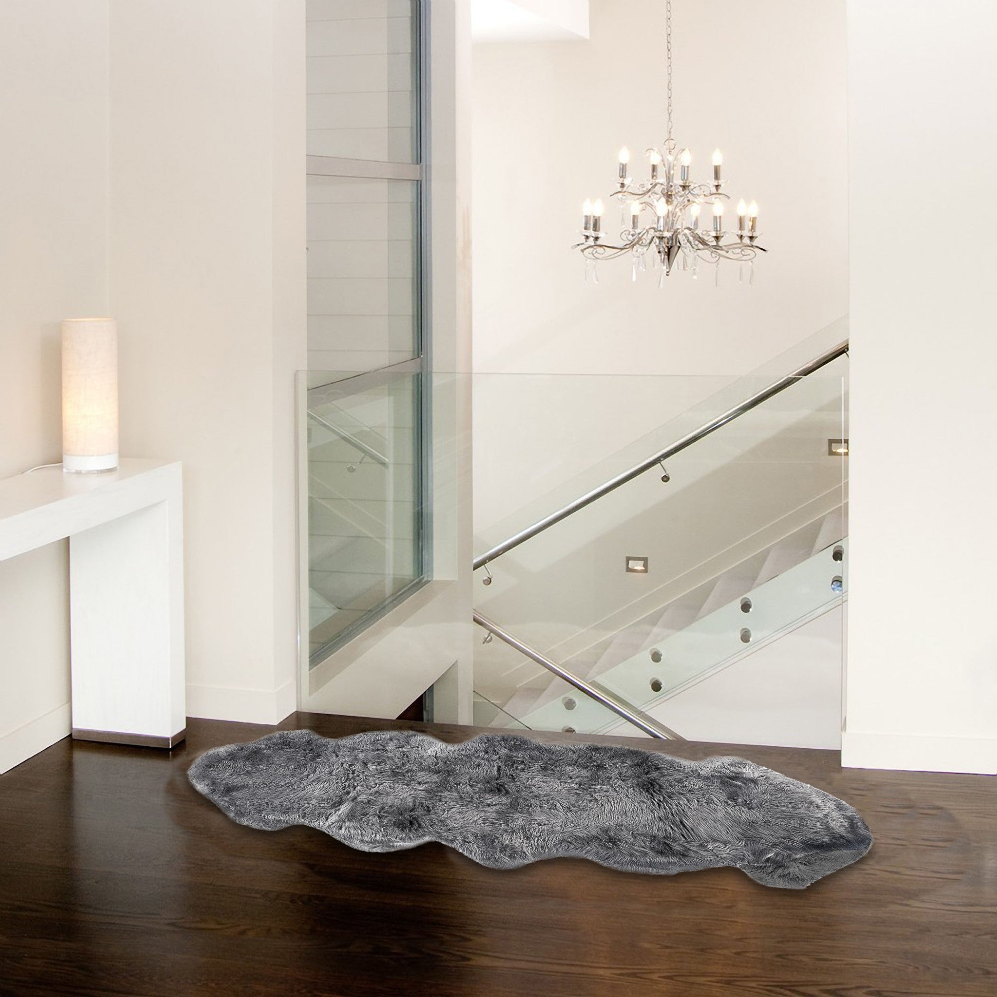 Luxurious gray double sheepskin area rug measuring 24x72 inches, showcasing its soft texture and elegant design.