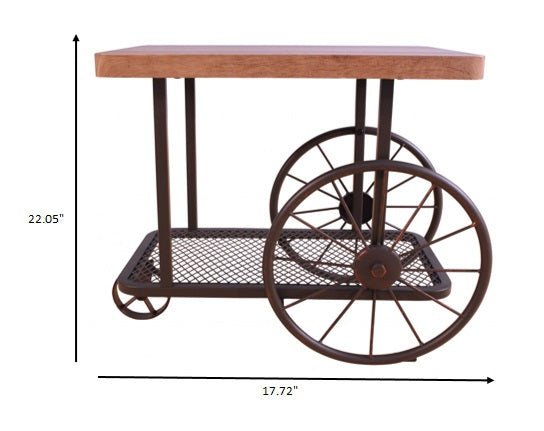 Gray Oak and Antique Metal Tube end table with butcher block top and metal mesh lower shelf, featuring cart-like wheels for mobility.