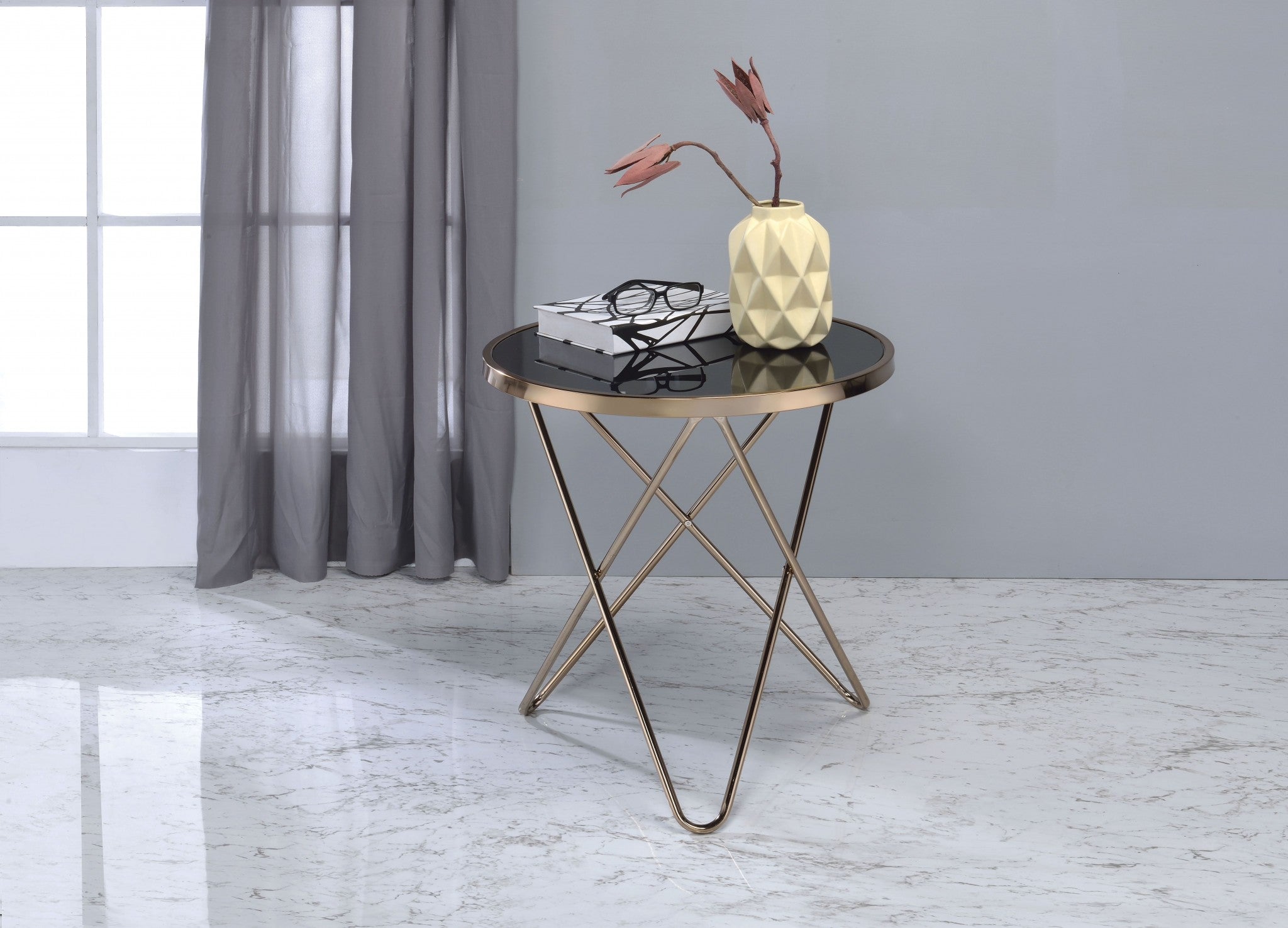 A stylish 22x22 frosted glass end table with champagne metal trim and a V-shape base, perfect for modern living rooms.