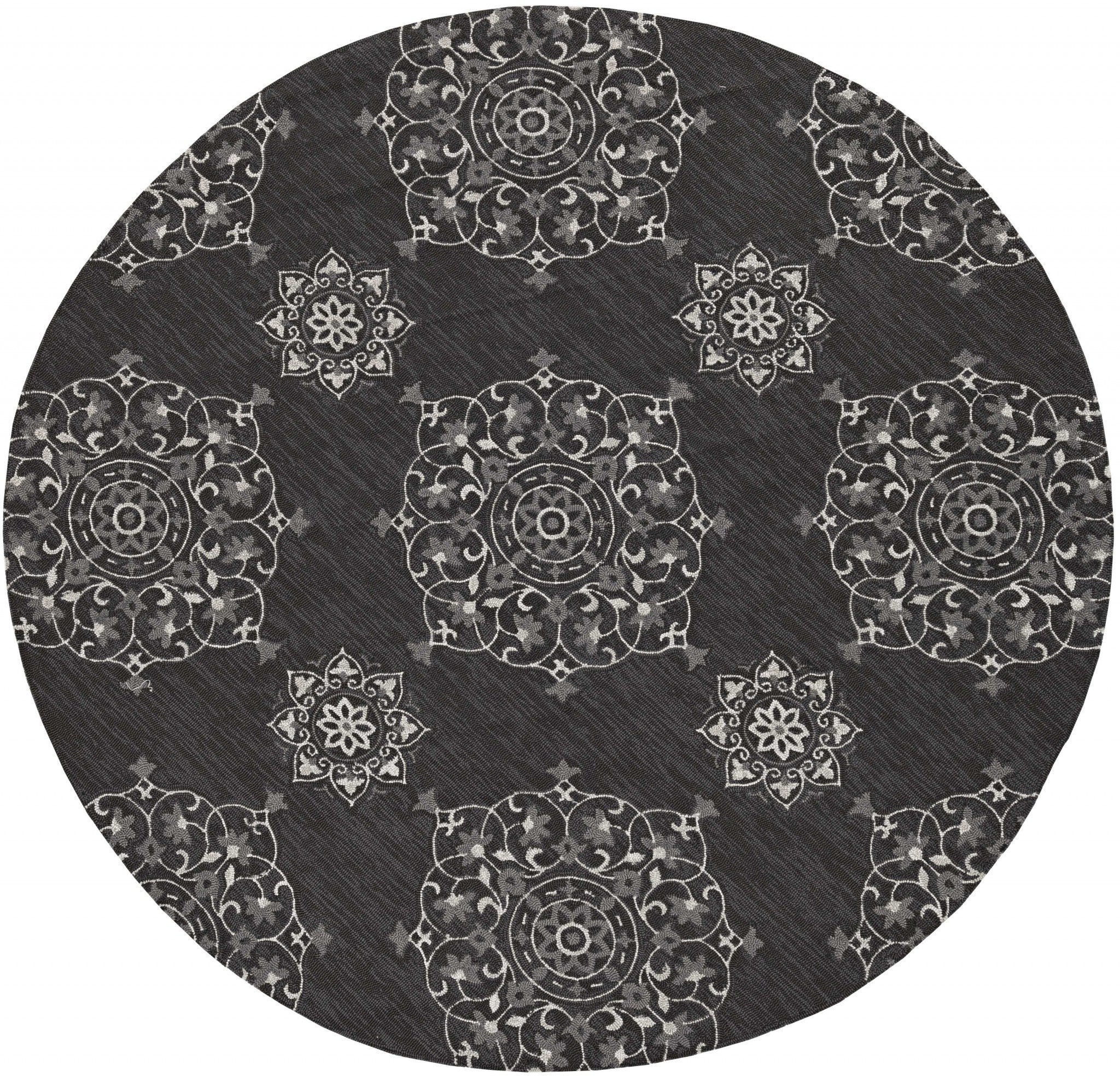 A stylish 2x3 inches charcoal polypropylene accent rug, showcasing a contemporary design suitable for indoor and outdoor use.