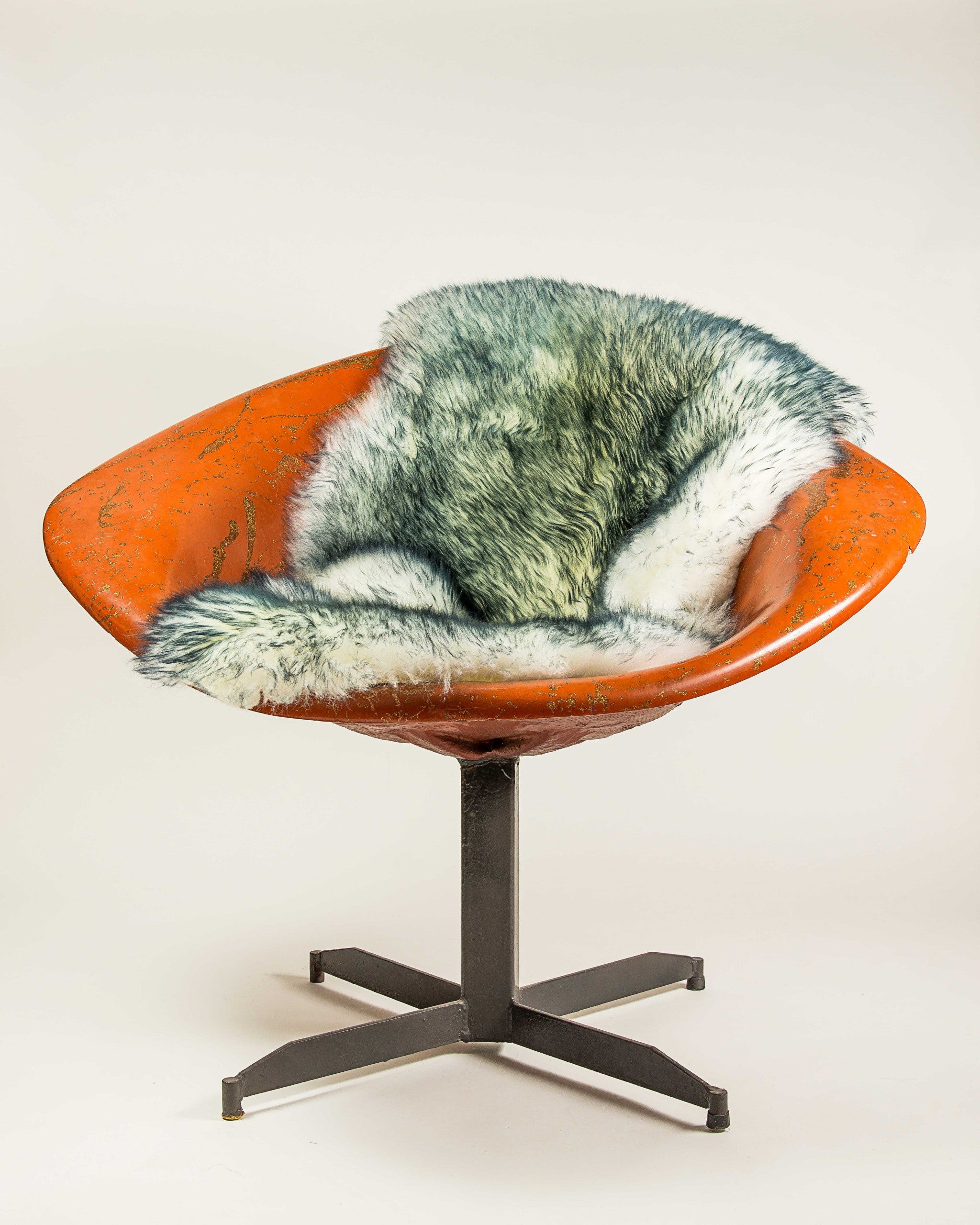 A luxurious 2x3 Gray Mist New Zealand Natural Sheepskin Rug showcasing its soft texture and elegant color, perfect for home decor.