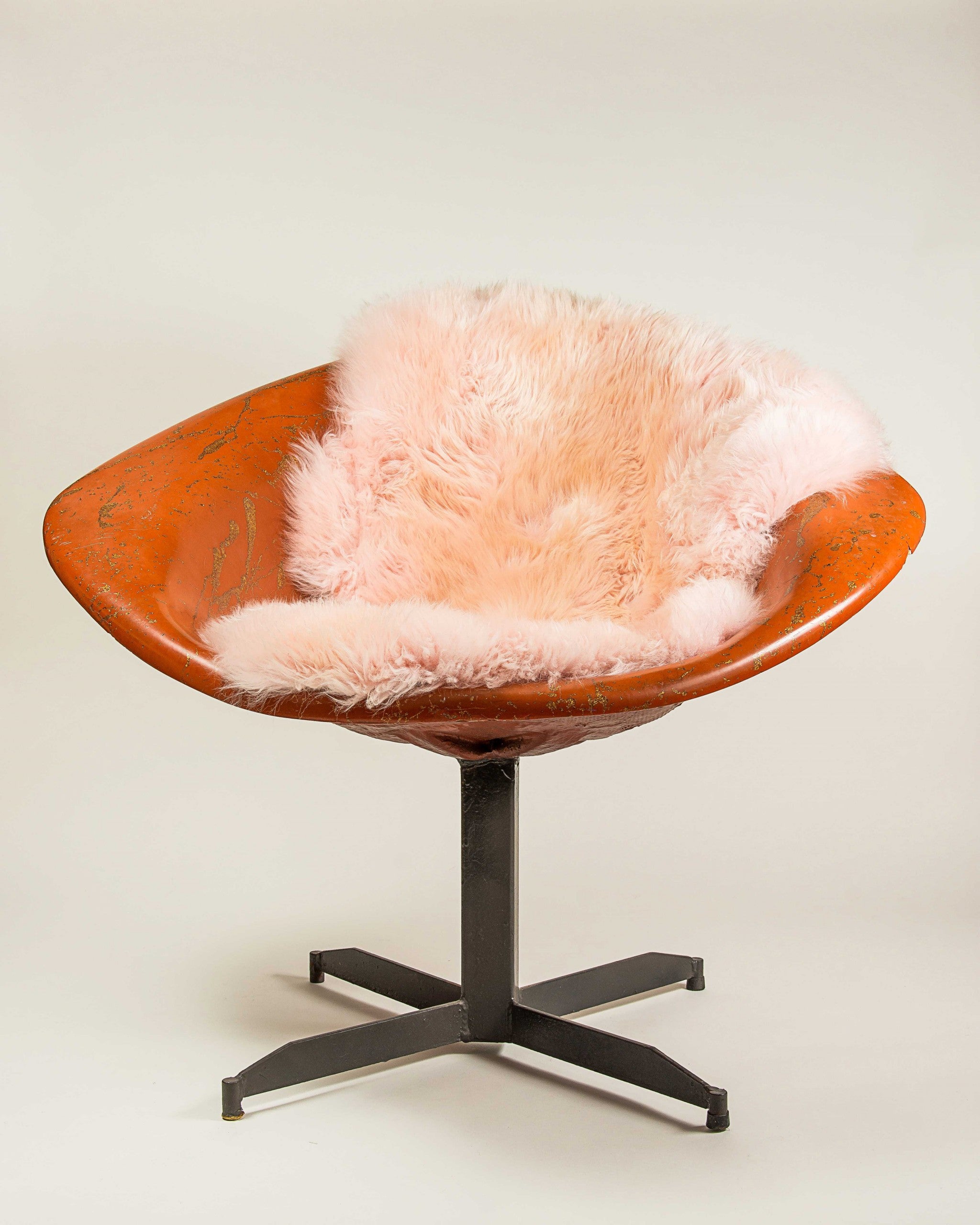 A luxurious 2x3 inches Rose New Zealand Natural Shearling Sheepskin Rug showcasing its soft texture and rich pink color, perfect for home decor.