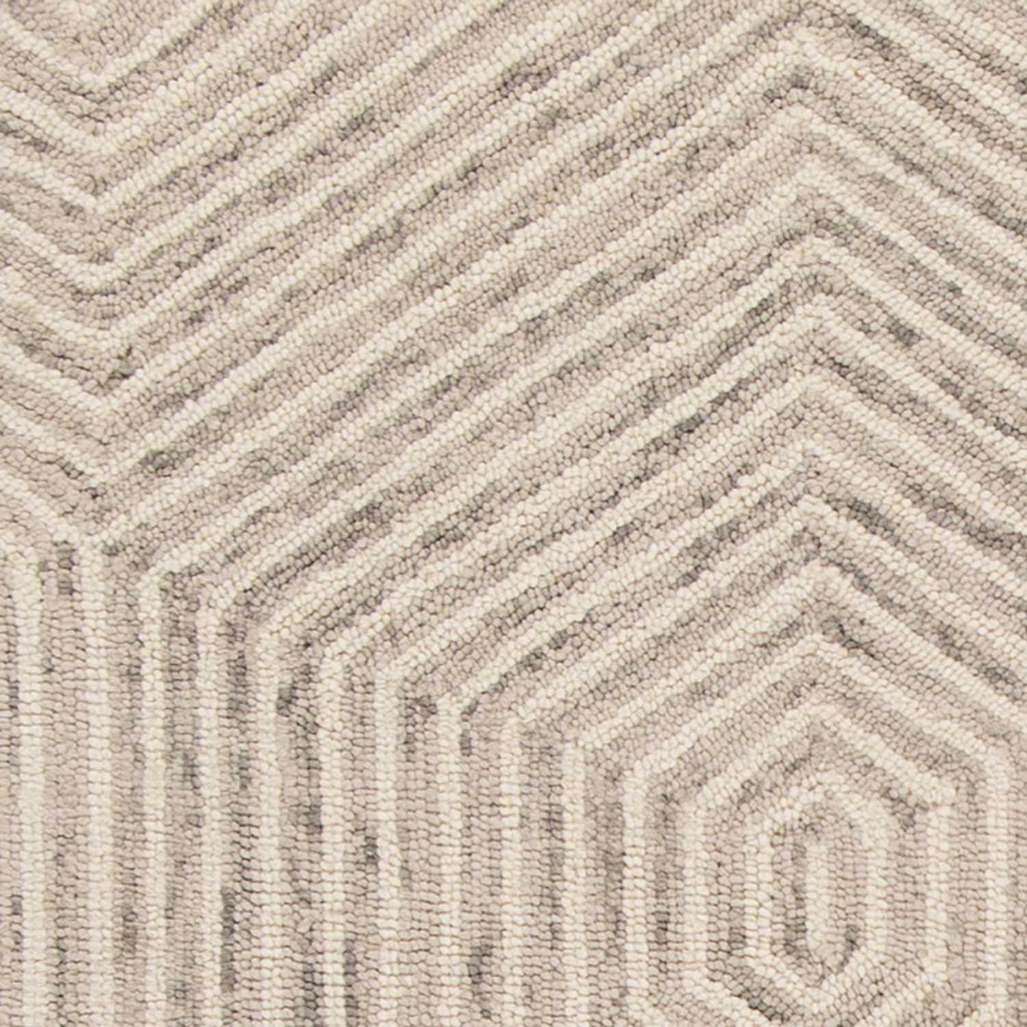 A luxurious 2x4 inches wool ivory area rug featuring a honeycomb design, hand-hooked in India, perfect for modern home decor.