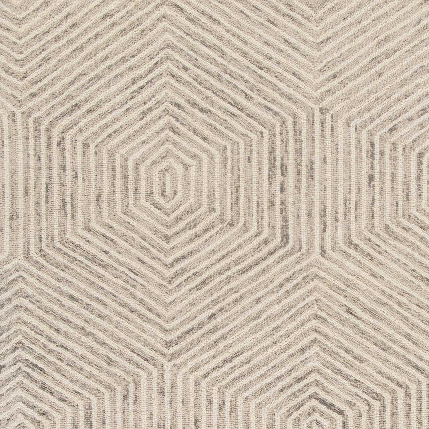 A luxurious 2x4 inches wool ivory area rug featuring a honeycomb design, hand-hooked in India, perfect for modern home decor.
