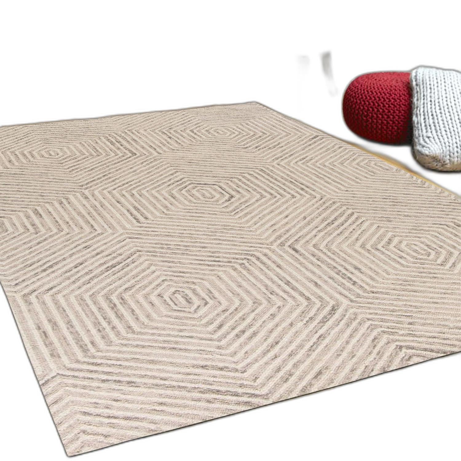 A luxurious 2x4 inches wool ivory area rug featuring a honeycomb design, hand-hooked in India, perfect for modern home decor.