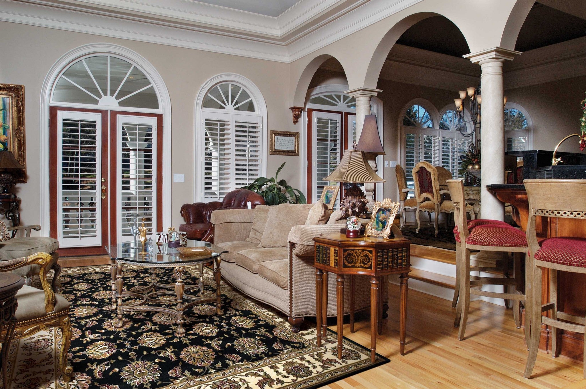 A beautiful 2x8 inches traditional bordered rug in black and ivory, showcasing intricate patterns and high-quality polypropylene material.