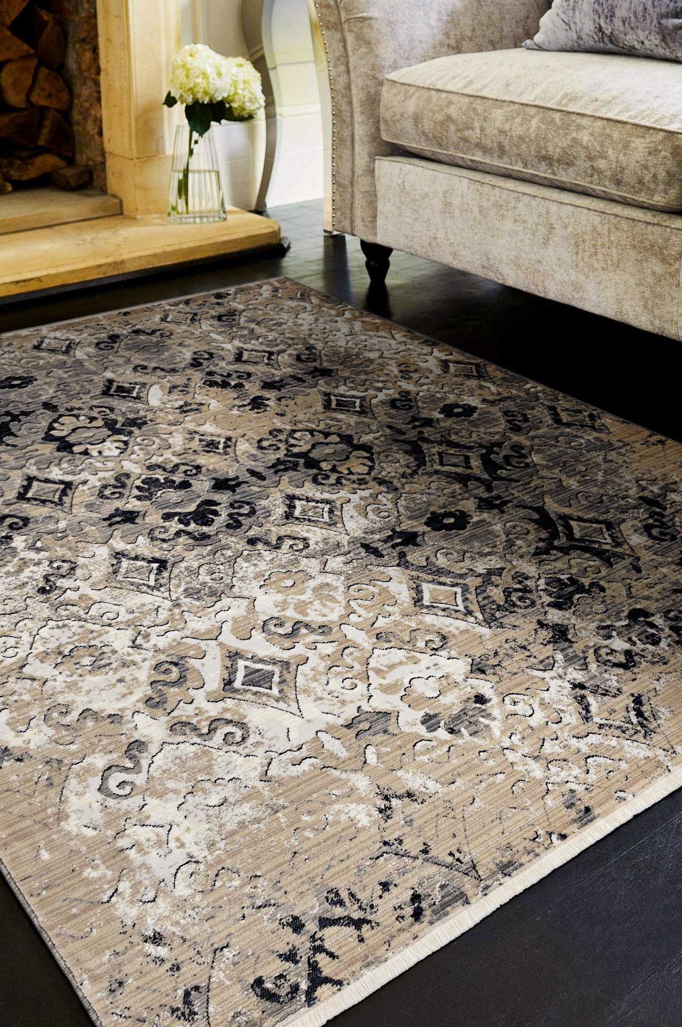 A beautiful 2x8 inches ivory and beige antique pattern runner rug showcasing a distressed vintage design, perfect for enhancing living spaces.