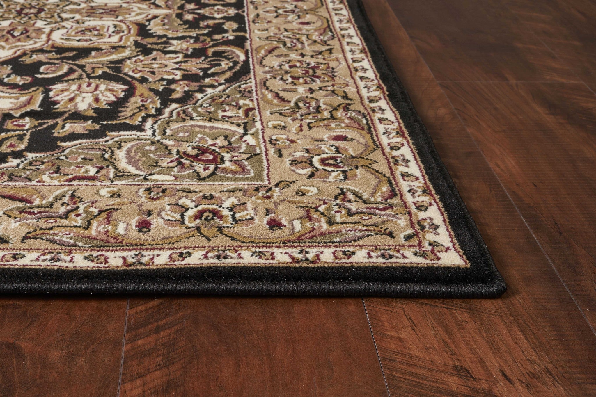 A beautiful black and beige floral medallion indoor rug, showcasing intricate patterns and a stylish design, perfect for enhancing home decor.